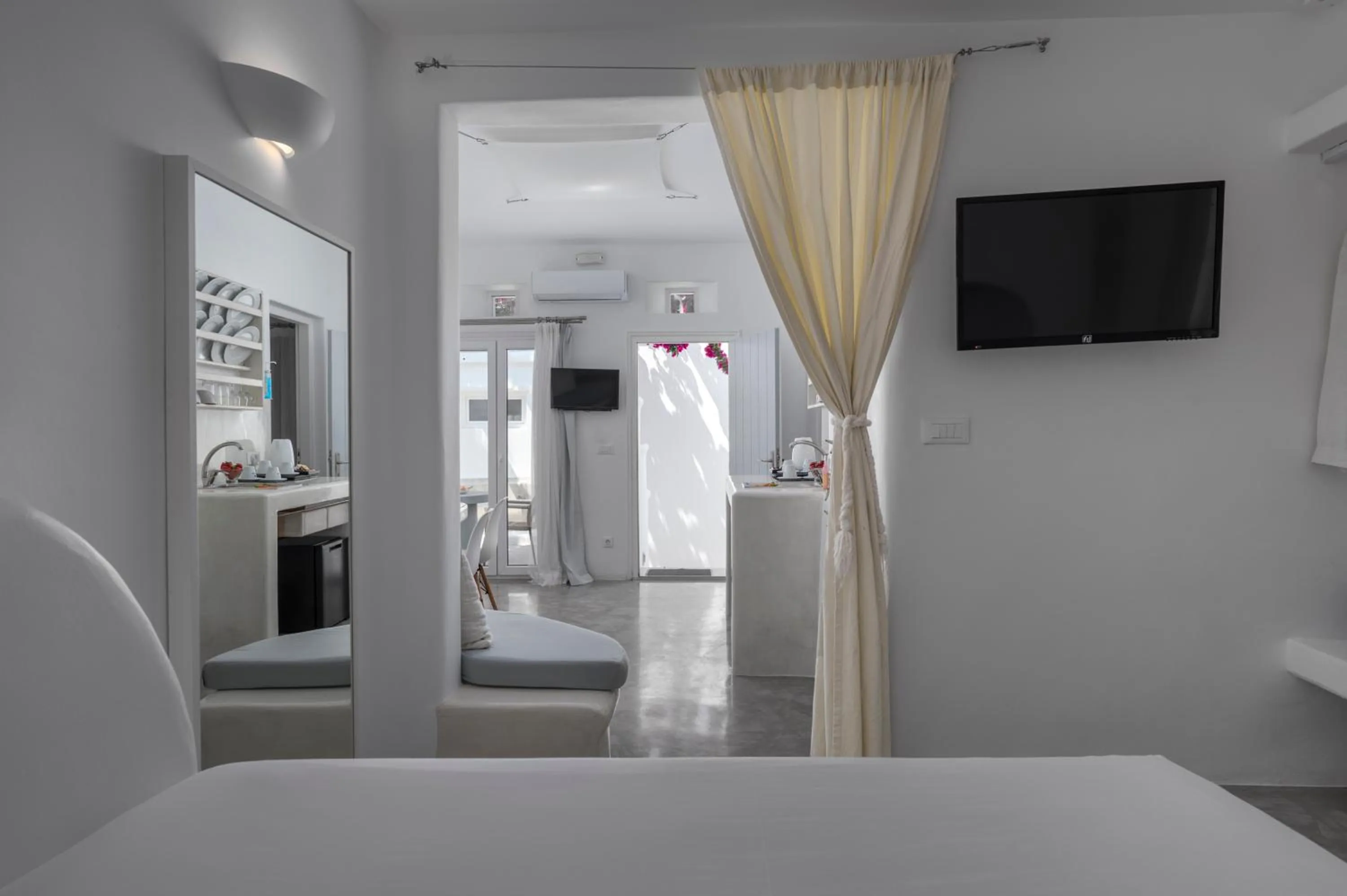 Bed in Flaskos Luxury Suites