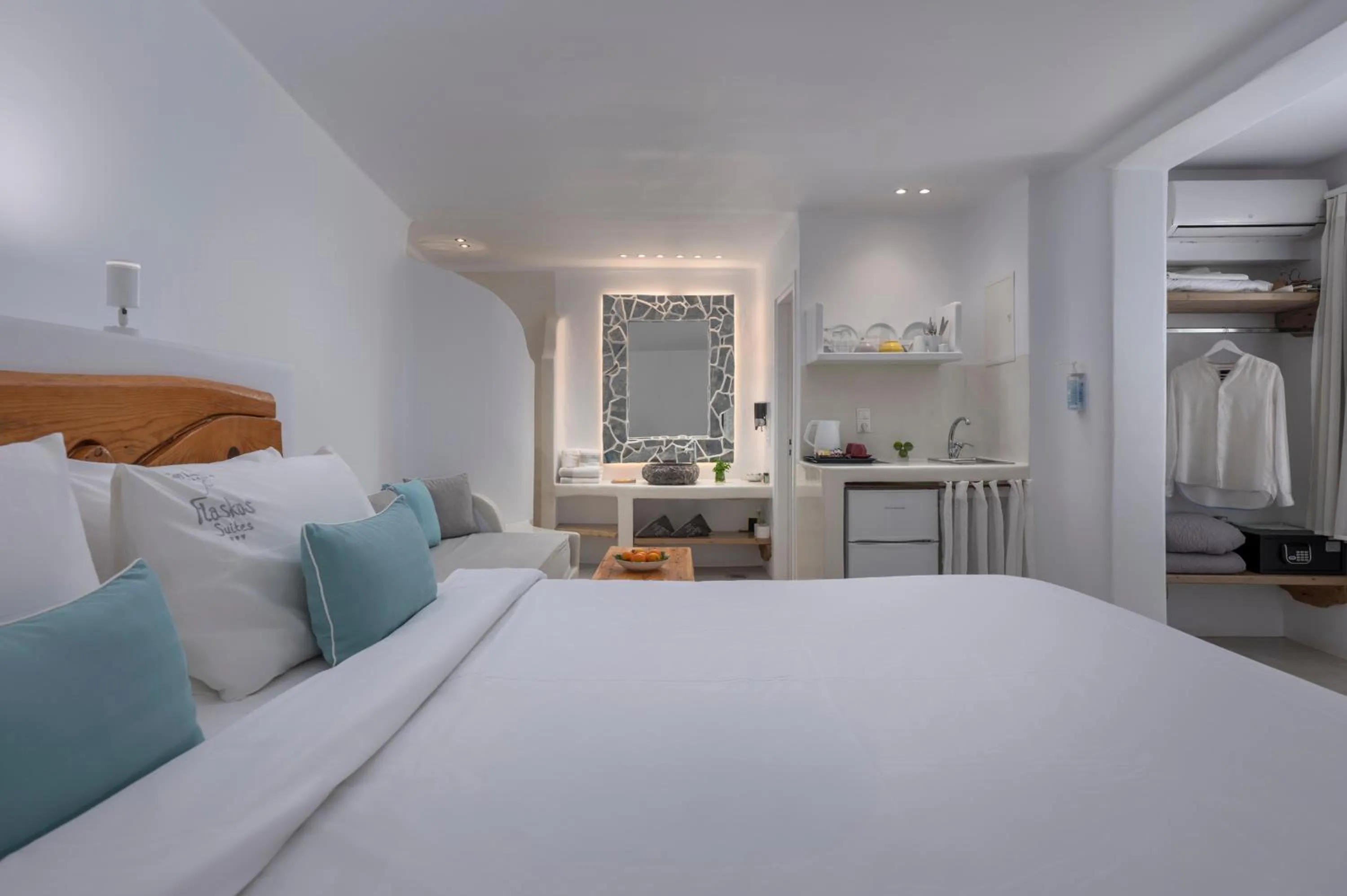 Bed in Flaskos Luxury Suites