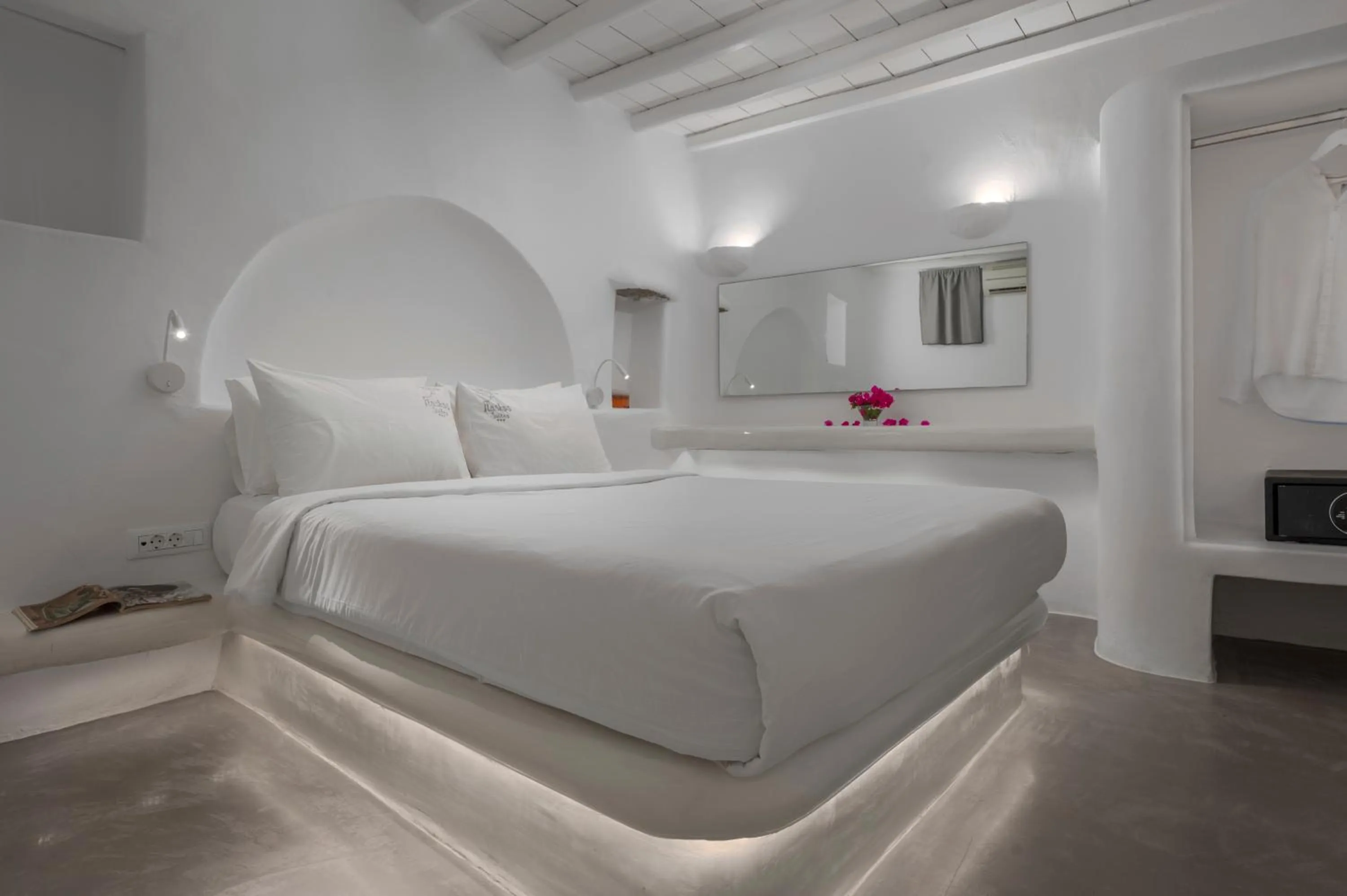 Bed in Flaskos Luxury Suites