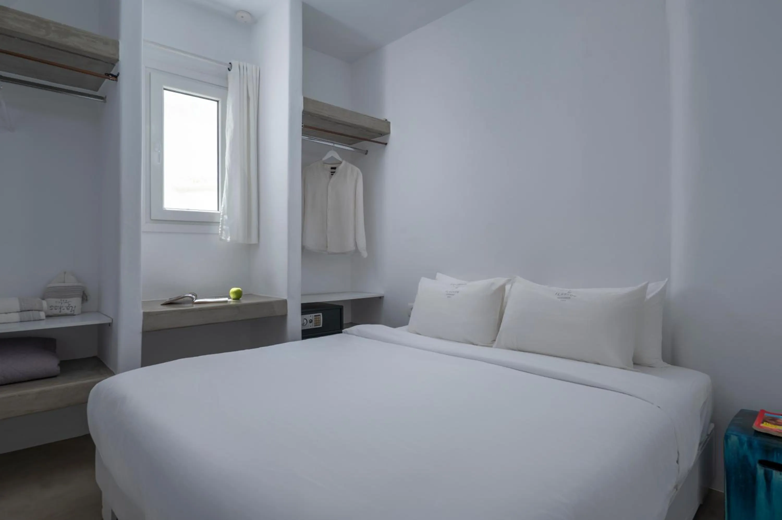 Bed in Flaskos Luxury Suites