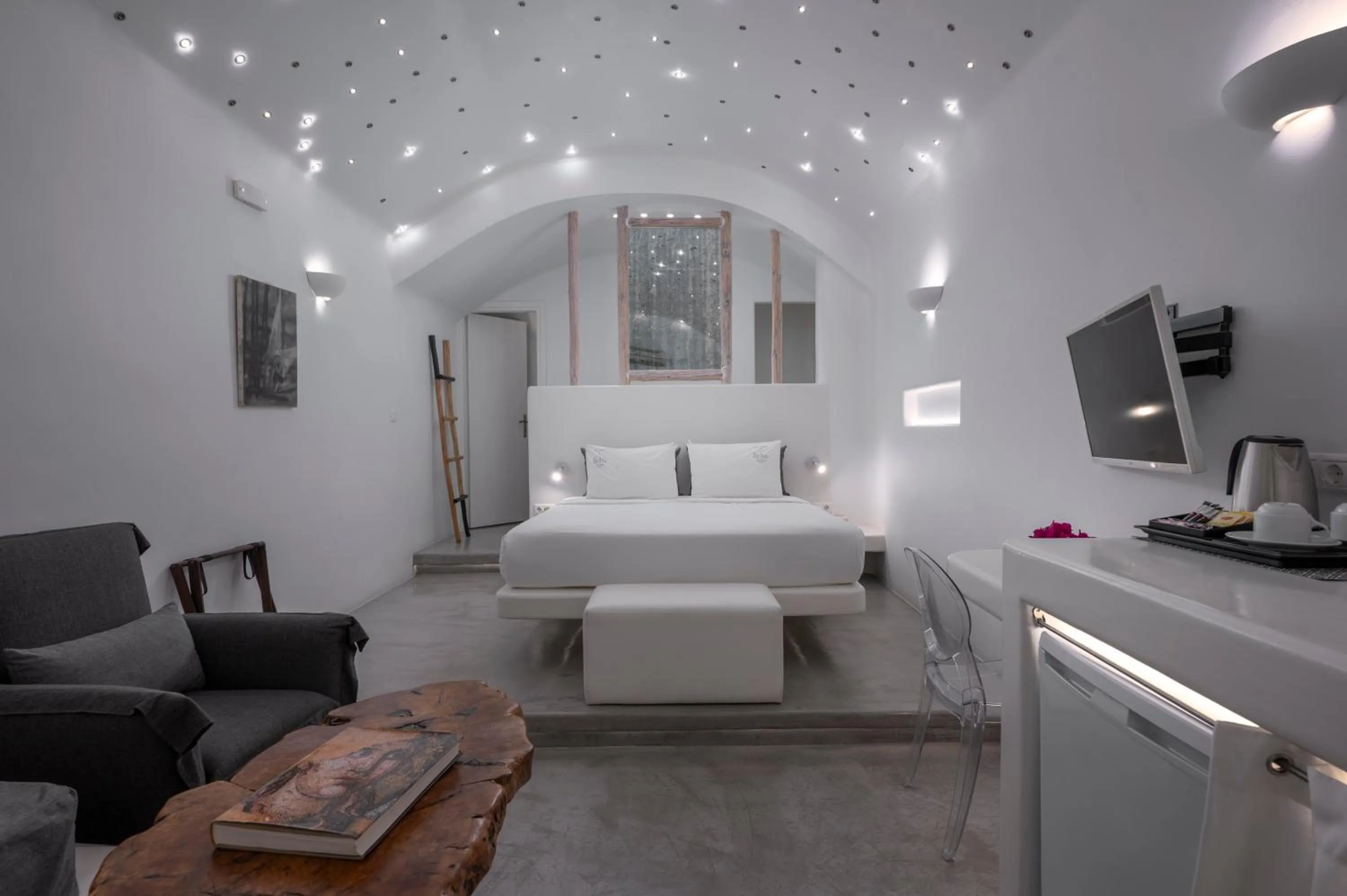 Bed in Flaskos Luxury Suites