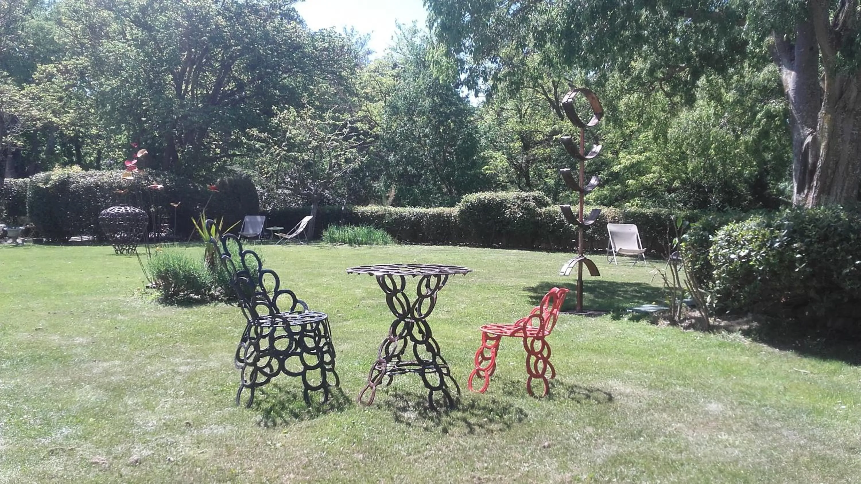 Garden in Logis Hôtel Château De Palaja