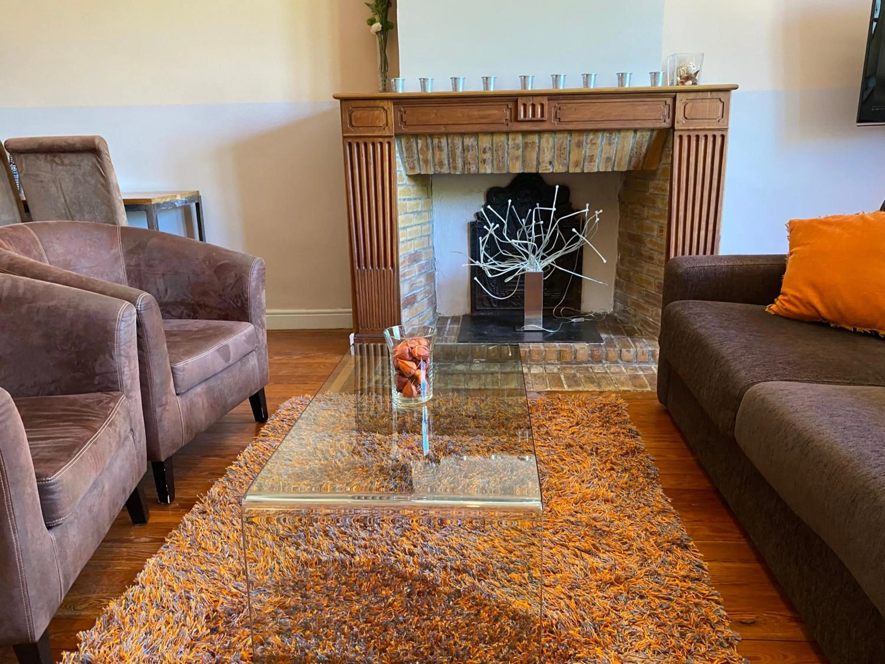 Seating area in Logis Hôtel Château De Palaja