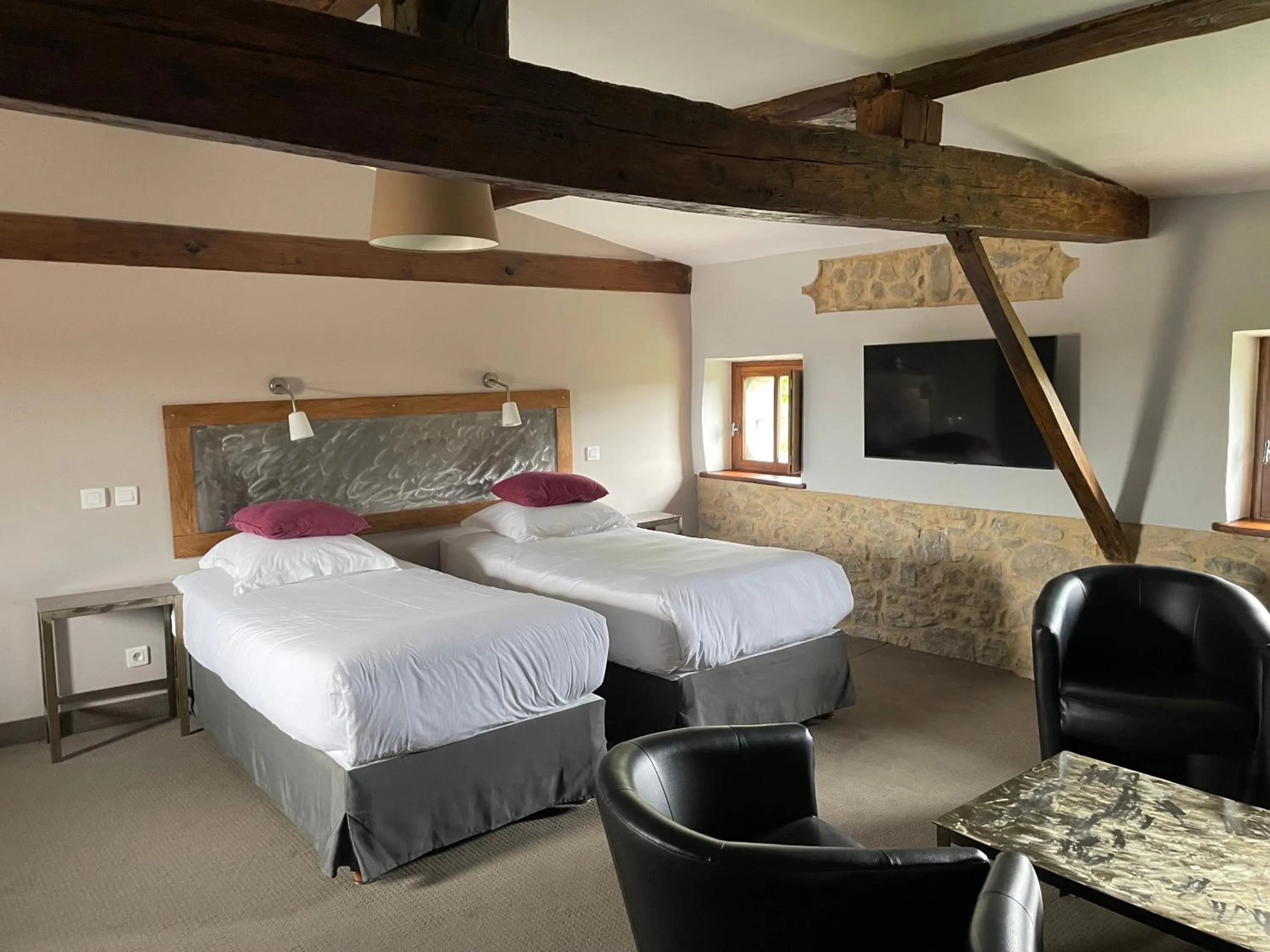 Bed in Logis Hôtel Château De Palaja