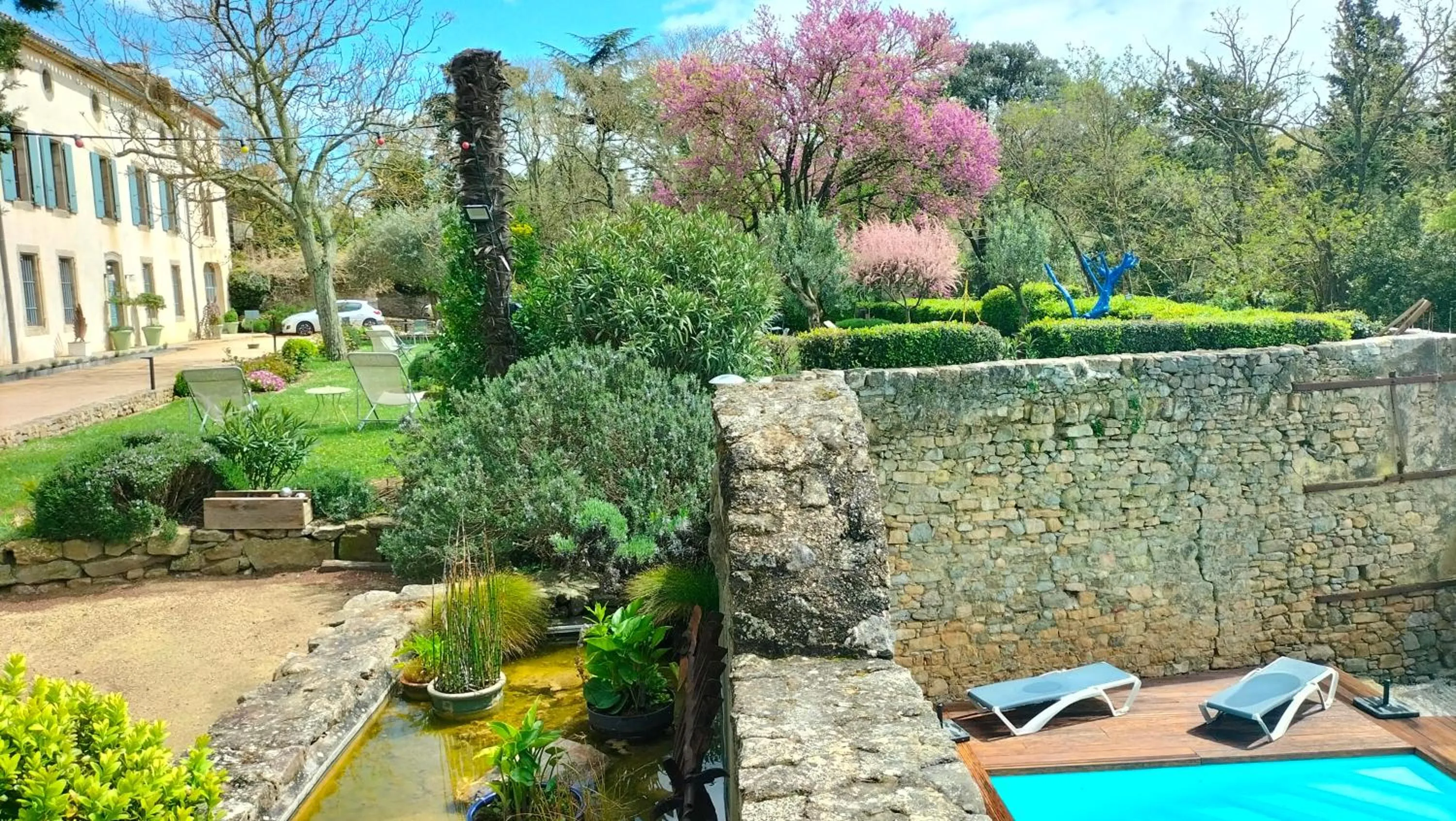 Garden in Logis Hôtel Château De Palaja