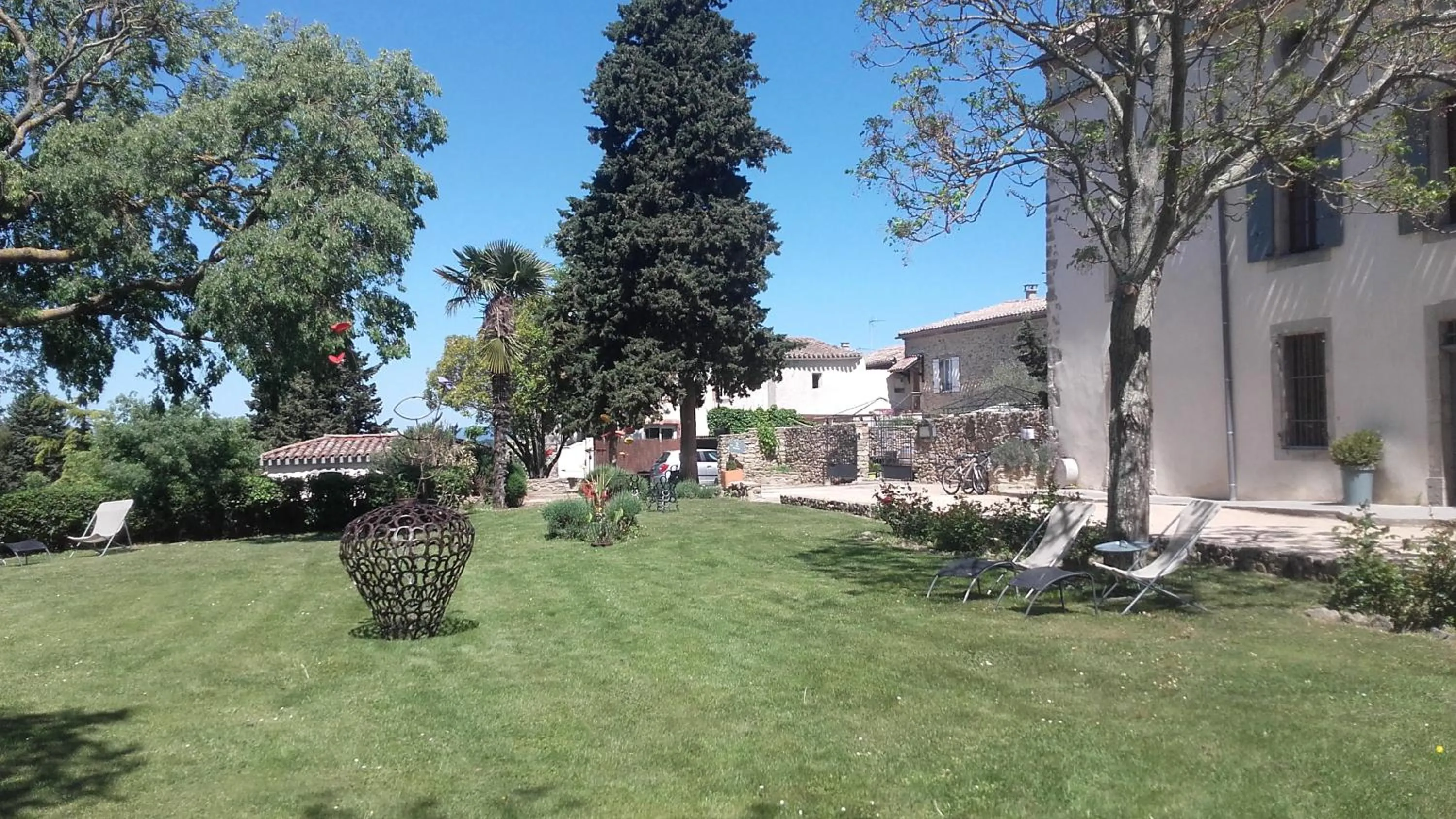 Garden in Logis Hôtel Château De Palaja