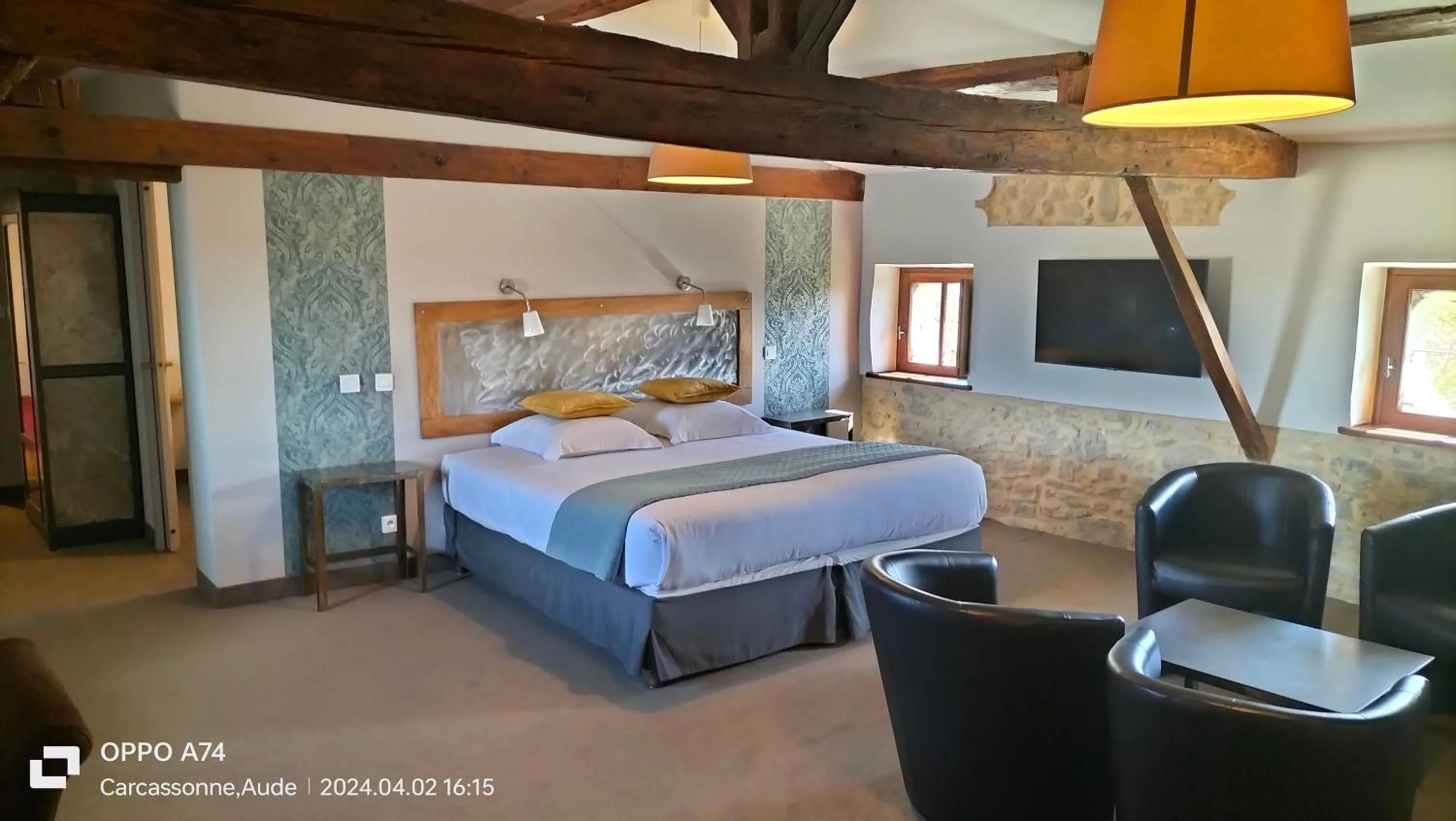 Bed in Logis Hôtel Château De Palaja