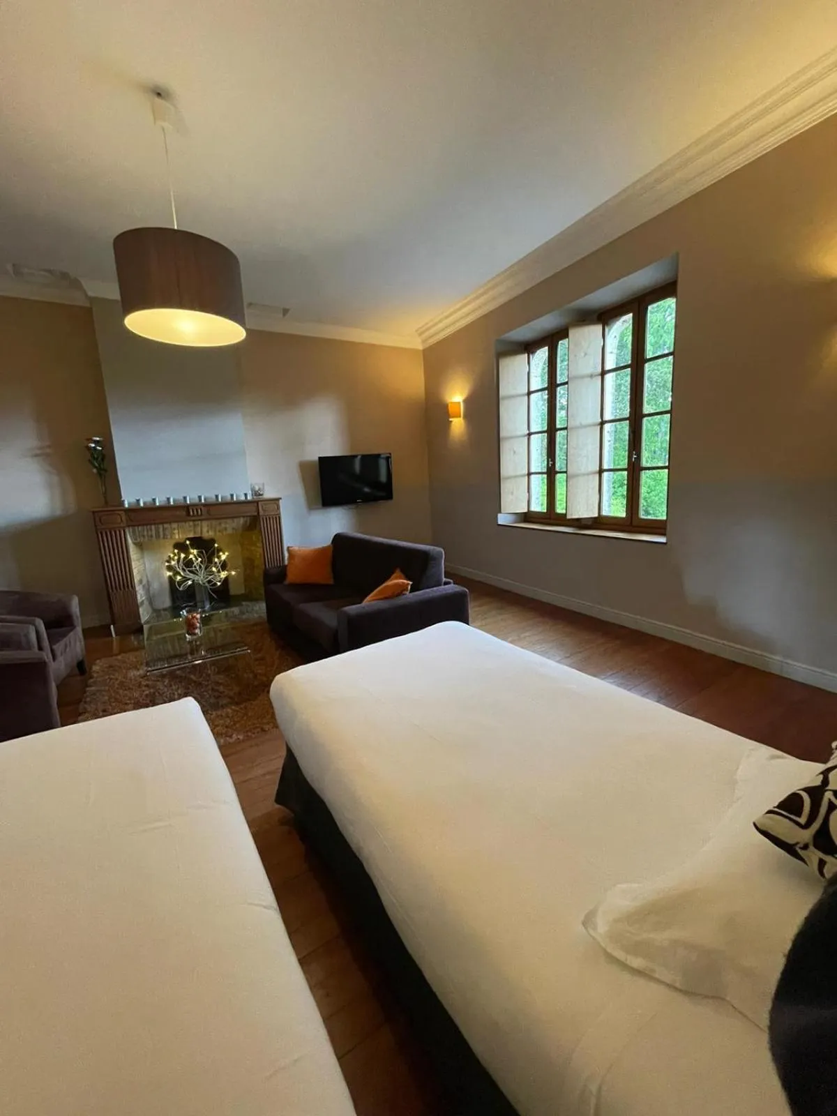 Bed in Logis Hôtel Château De Palaja