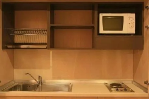 Kitchen or kitchenette in Silver Residence Hotel