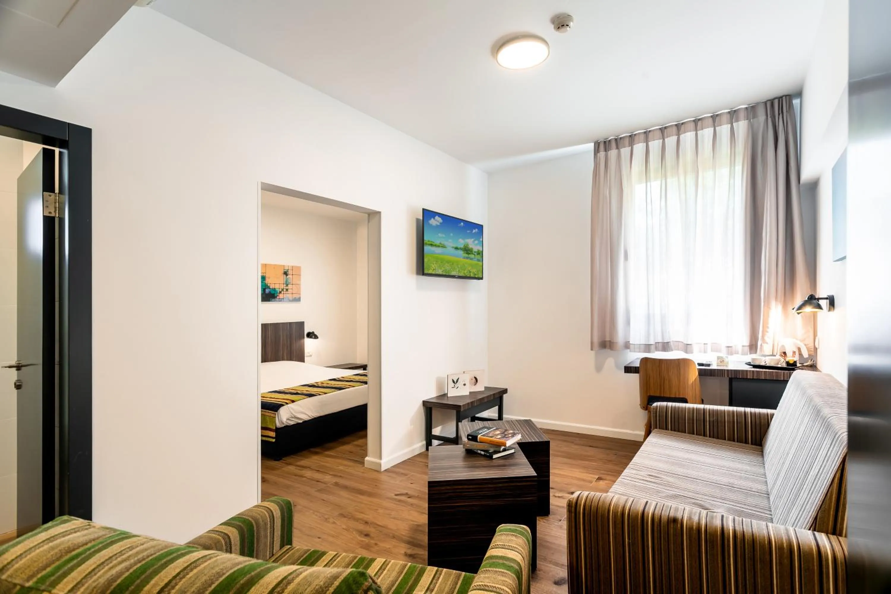 Living room, Bed in Nof Tavor Hotel