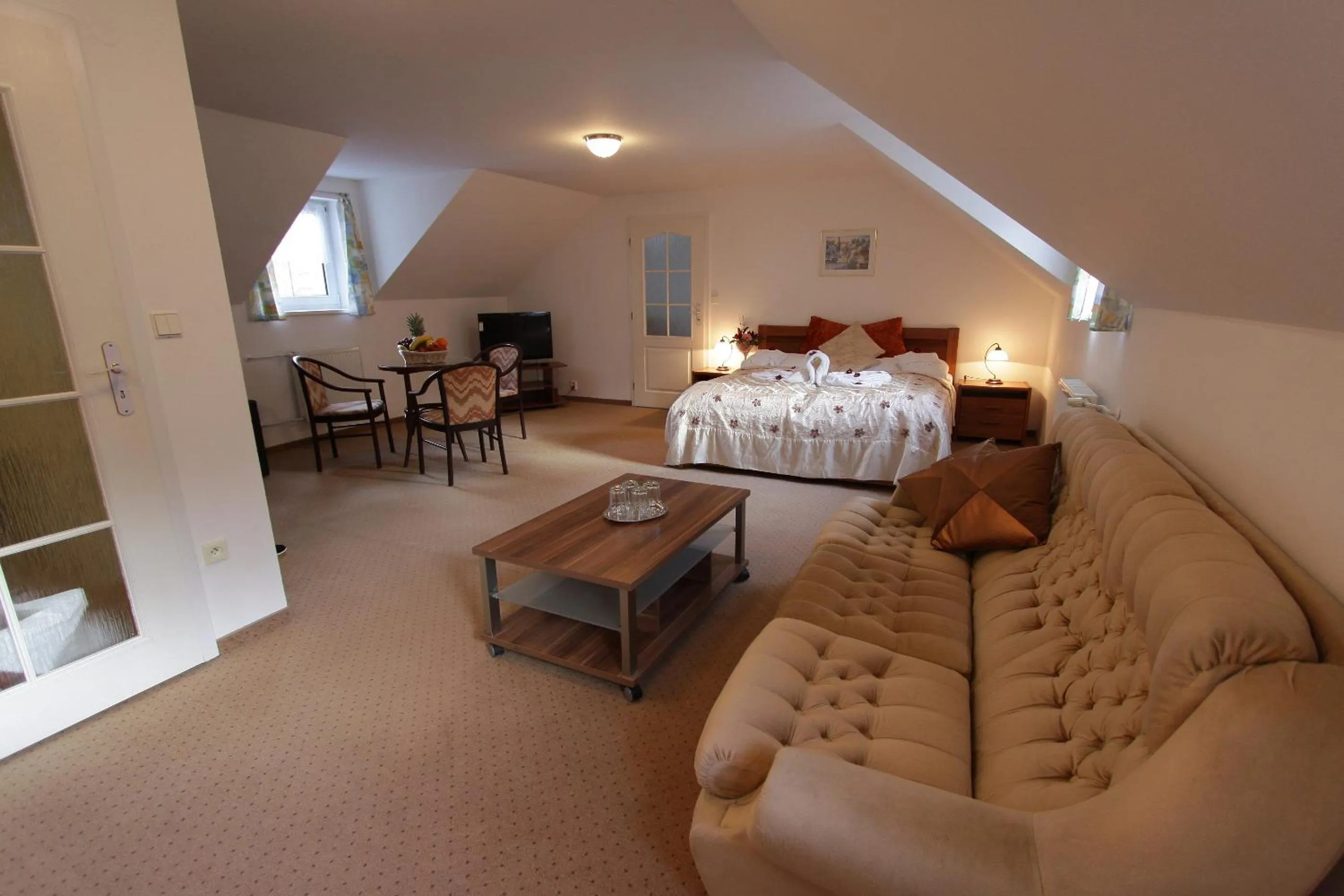 Living room, Bed in Spa & Wellness Hotel Harmonie