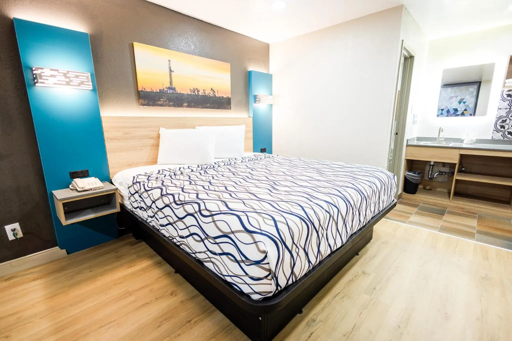 Bed in West Texas Inn & Suites with Kitchenette