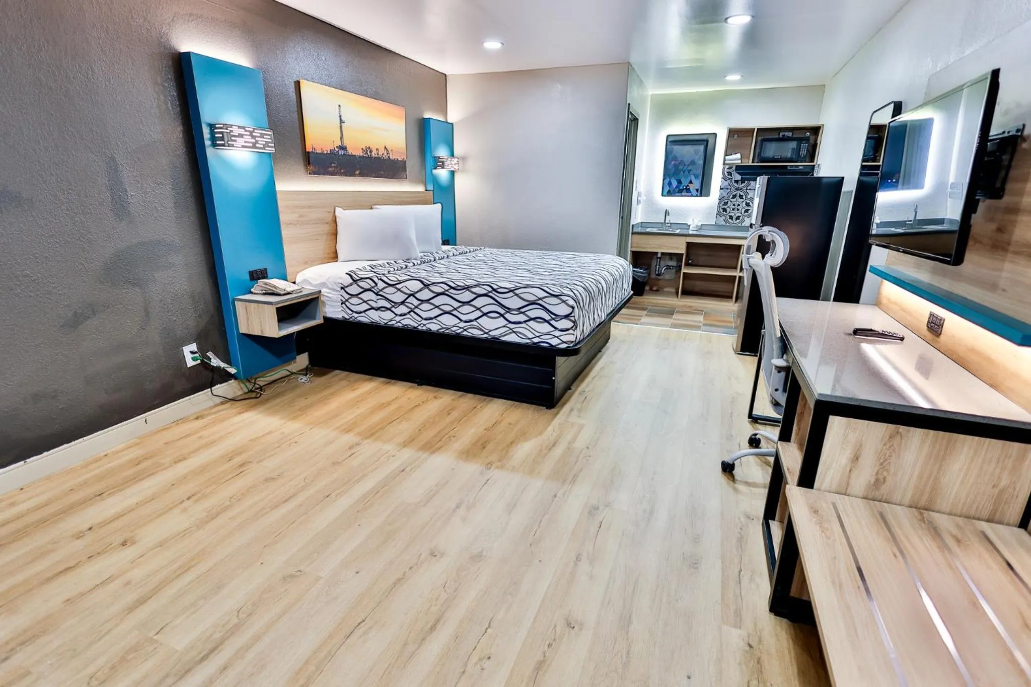 Bed in West Texas Inn & Suites with Kitchenette