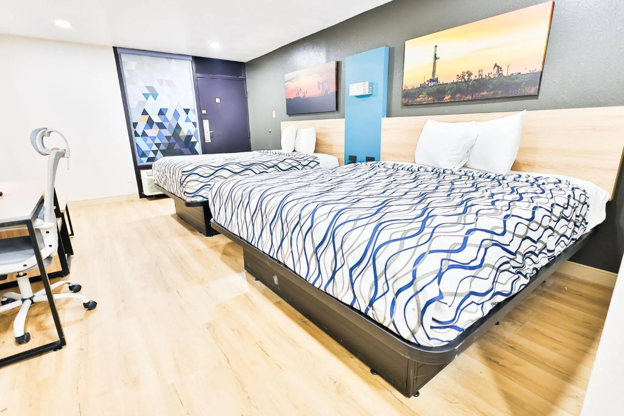 Bed in West Texas Inn & Suites with Kitchenette