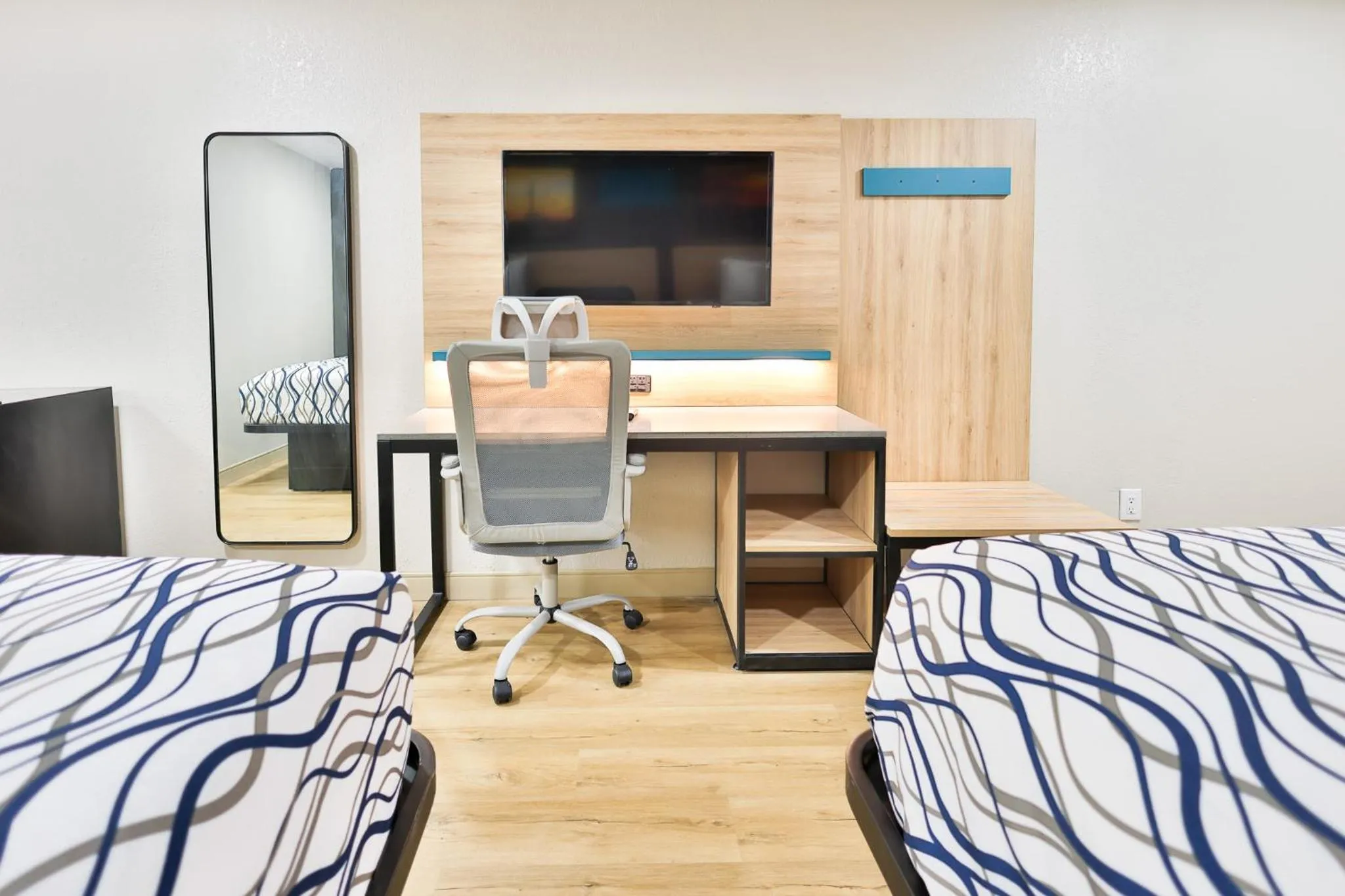 Bed in West Texas Inn & Suites with Kitchenette