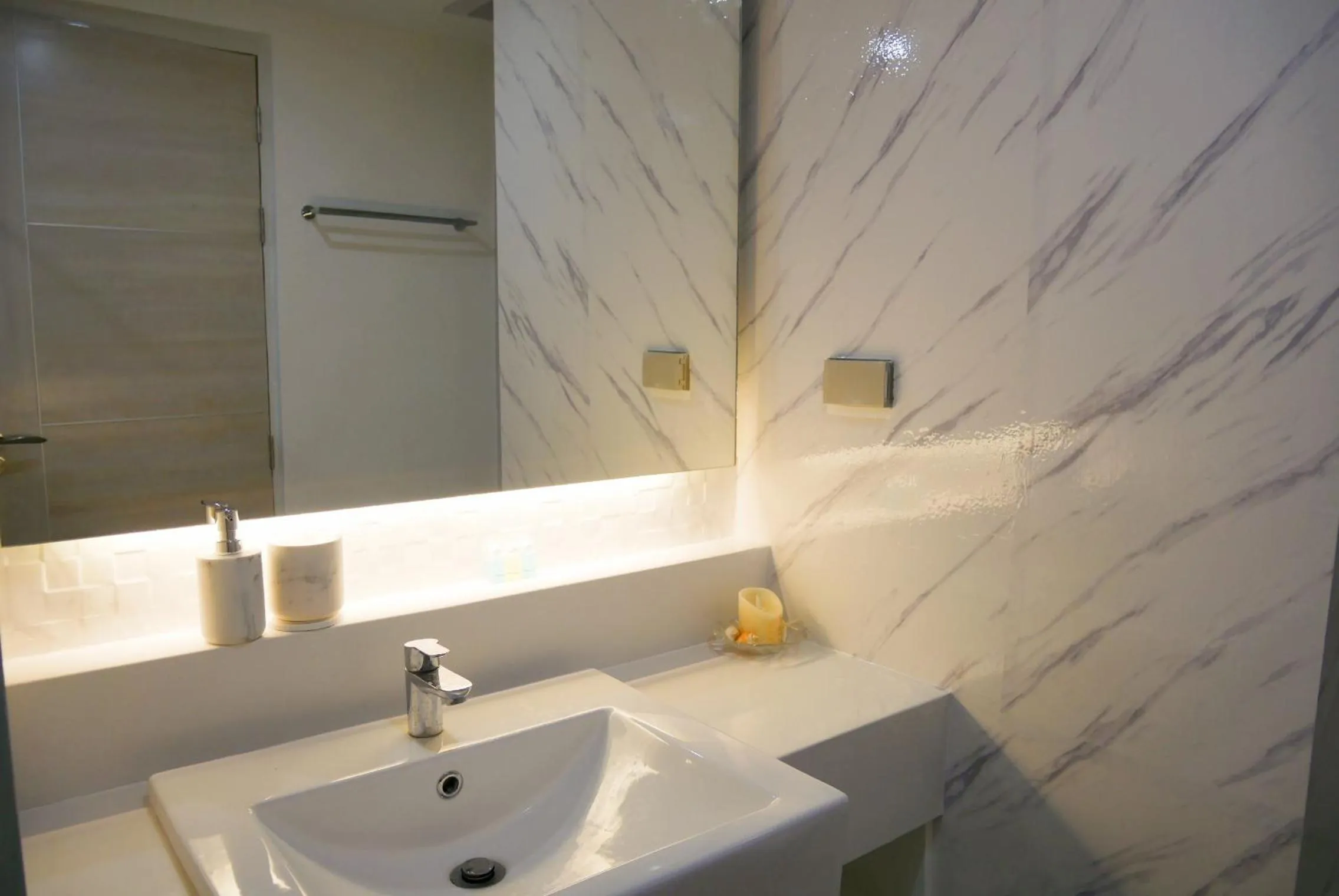 Bathroom in Seven Seas Resort Pattaya & Sofa bed