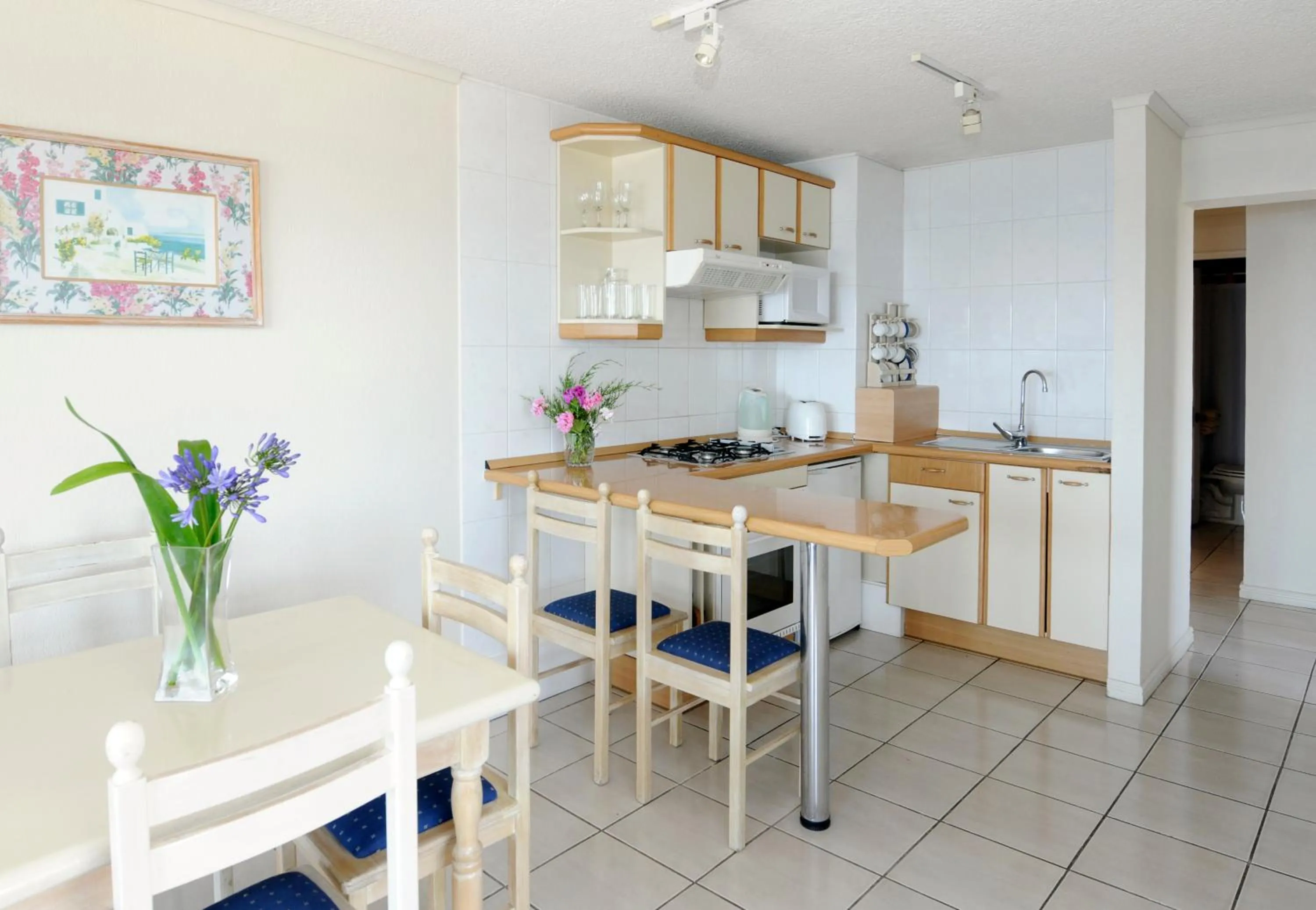 Kitchen or kitchenette in MR Mar Suites (ex Neruda Mar Suites)