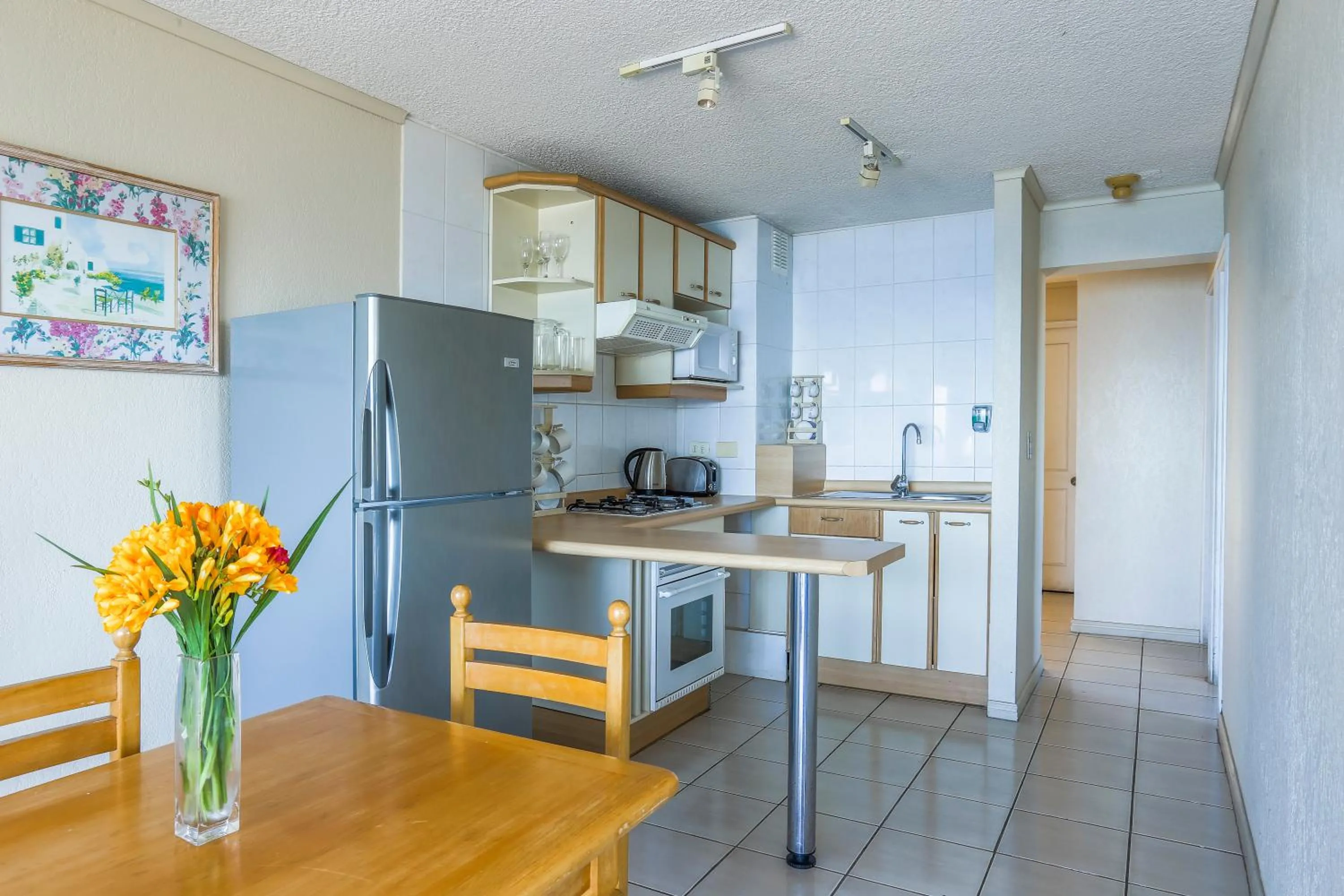 Kitchen or kitchenette in MR Mar Suites (ex Neruda Mar Suites)