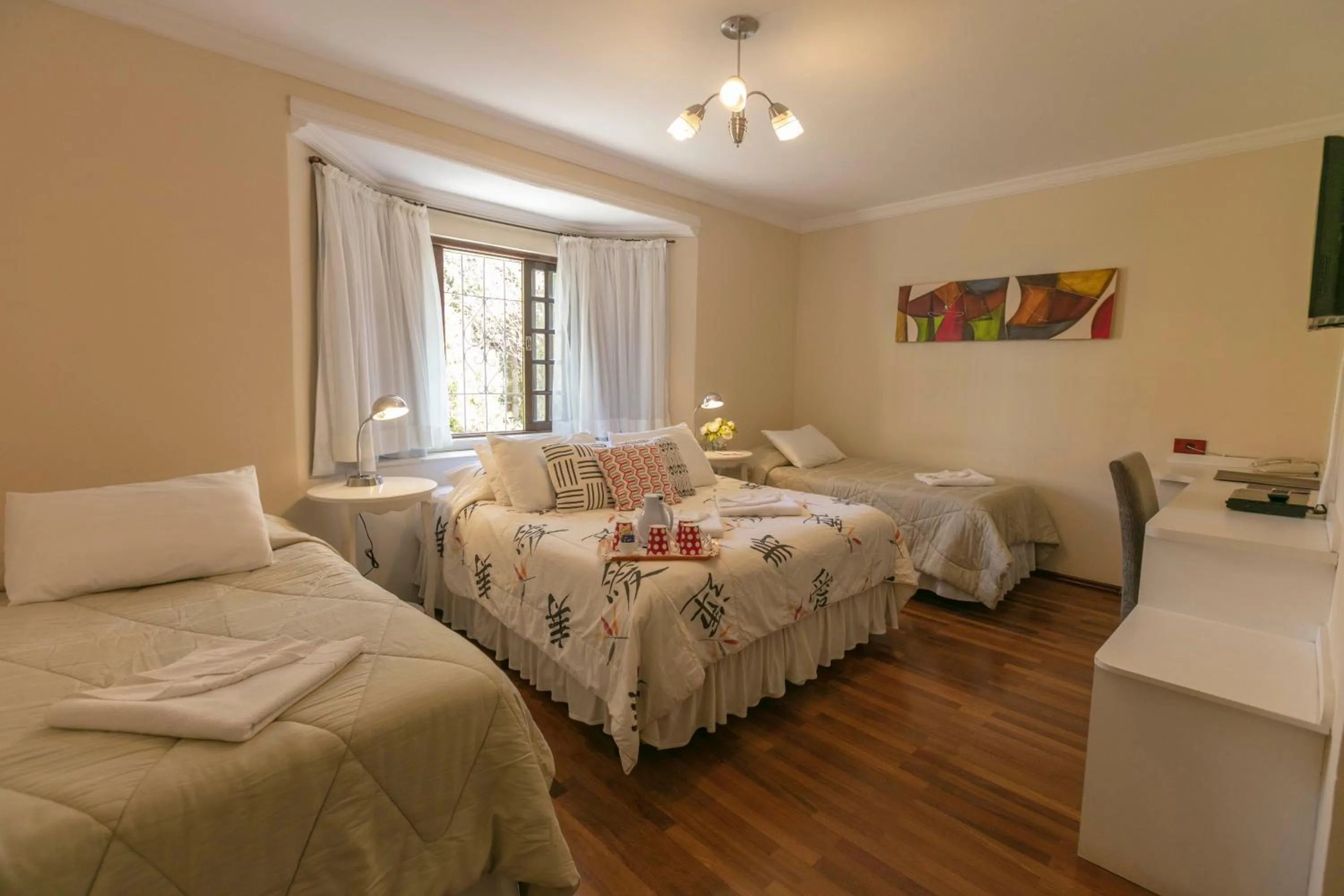 Bed in Pousada das Hortênsias