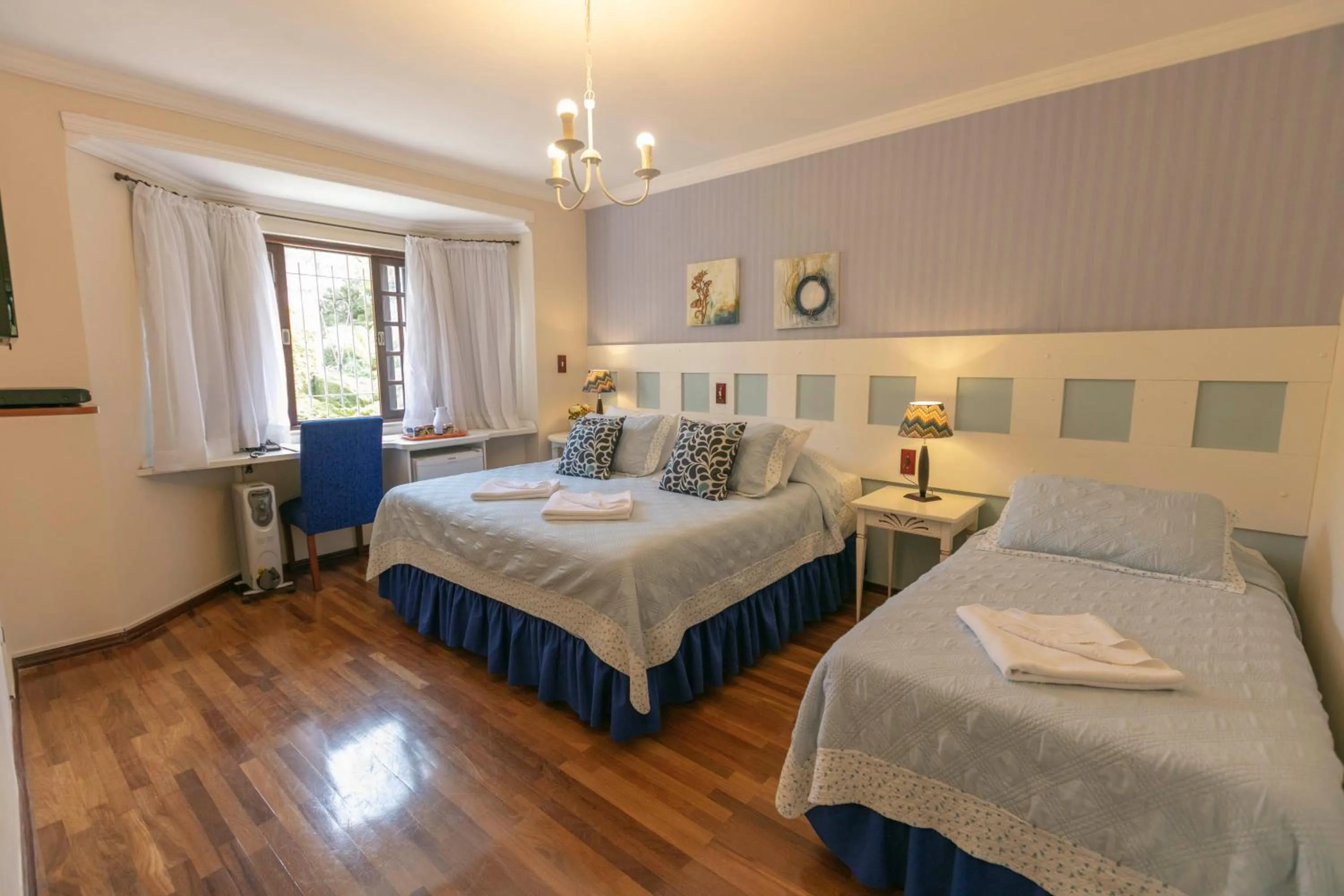 Bed in Pousada das Hortênsias