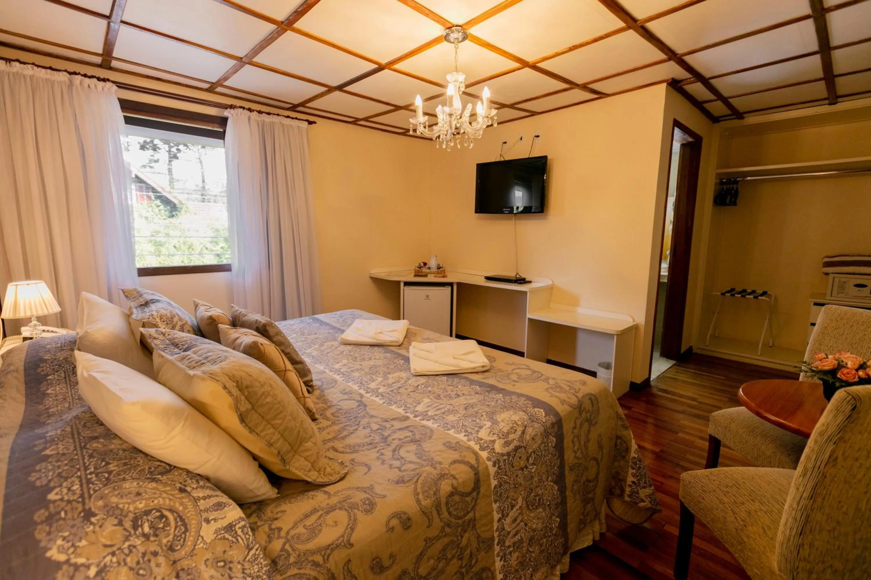 Bed in Pousada das Hortênsias