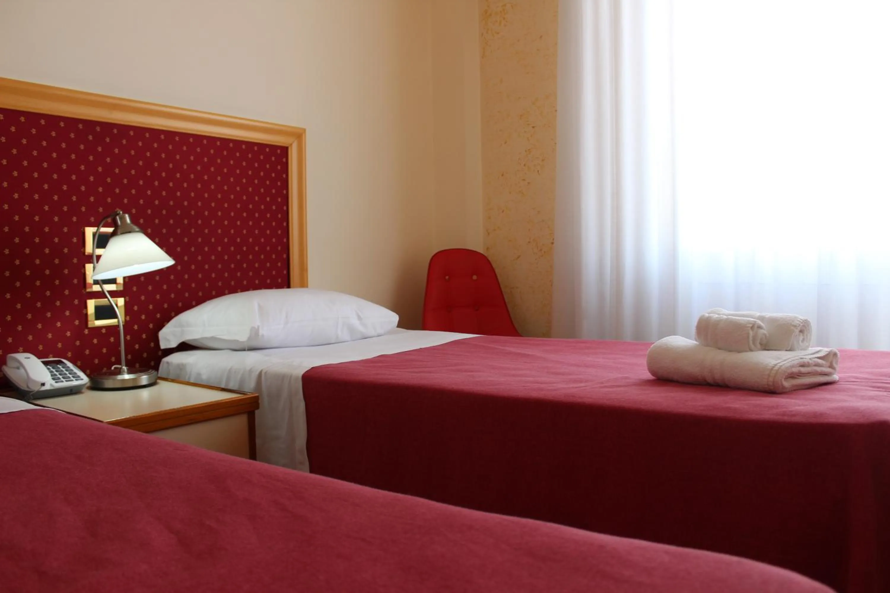 Bed in Hotel Palace Masoanri's