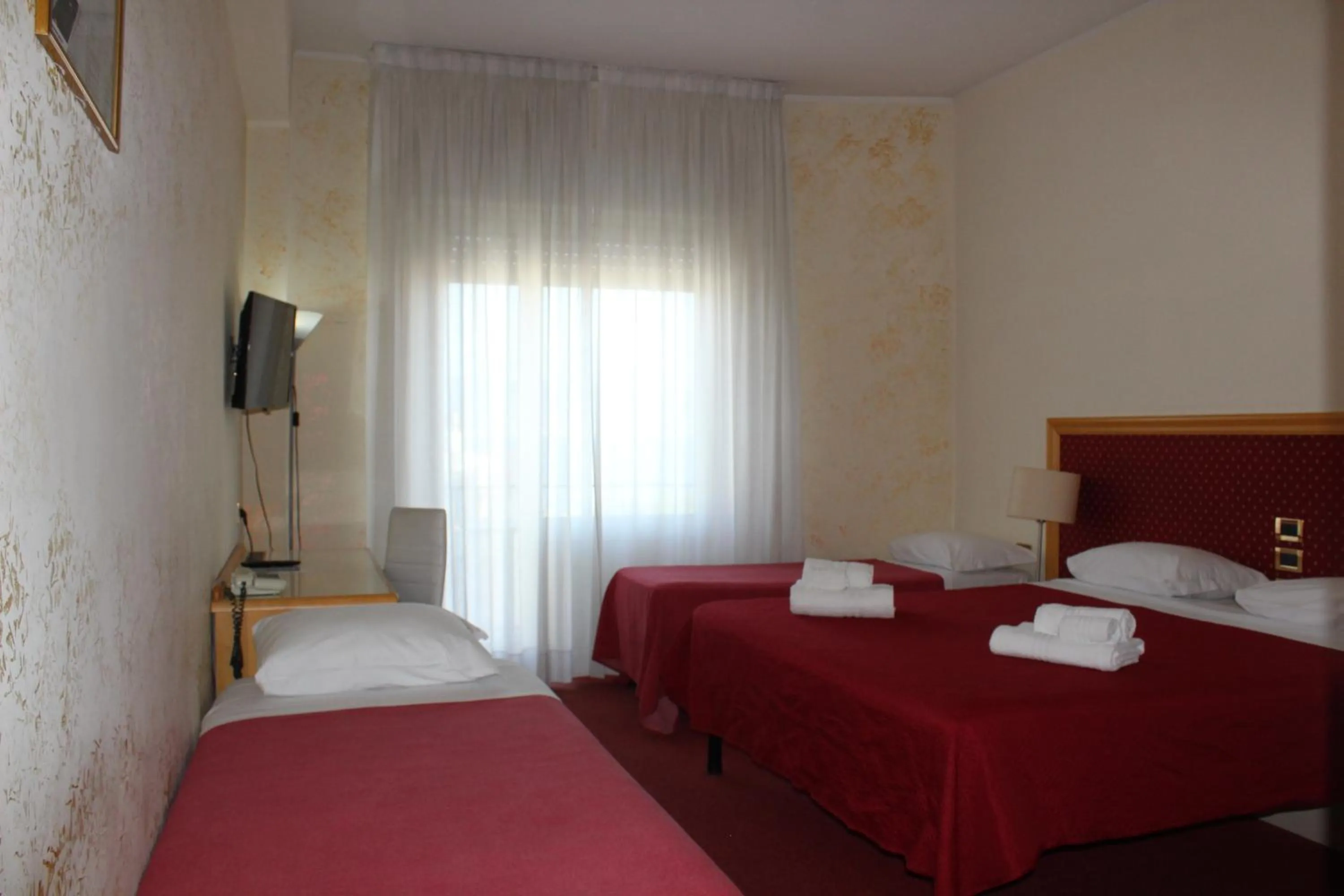 Bed in Hotel Palace Masoanri's