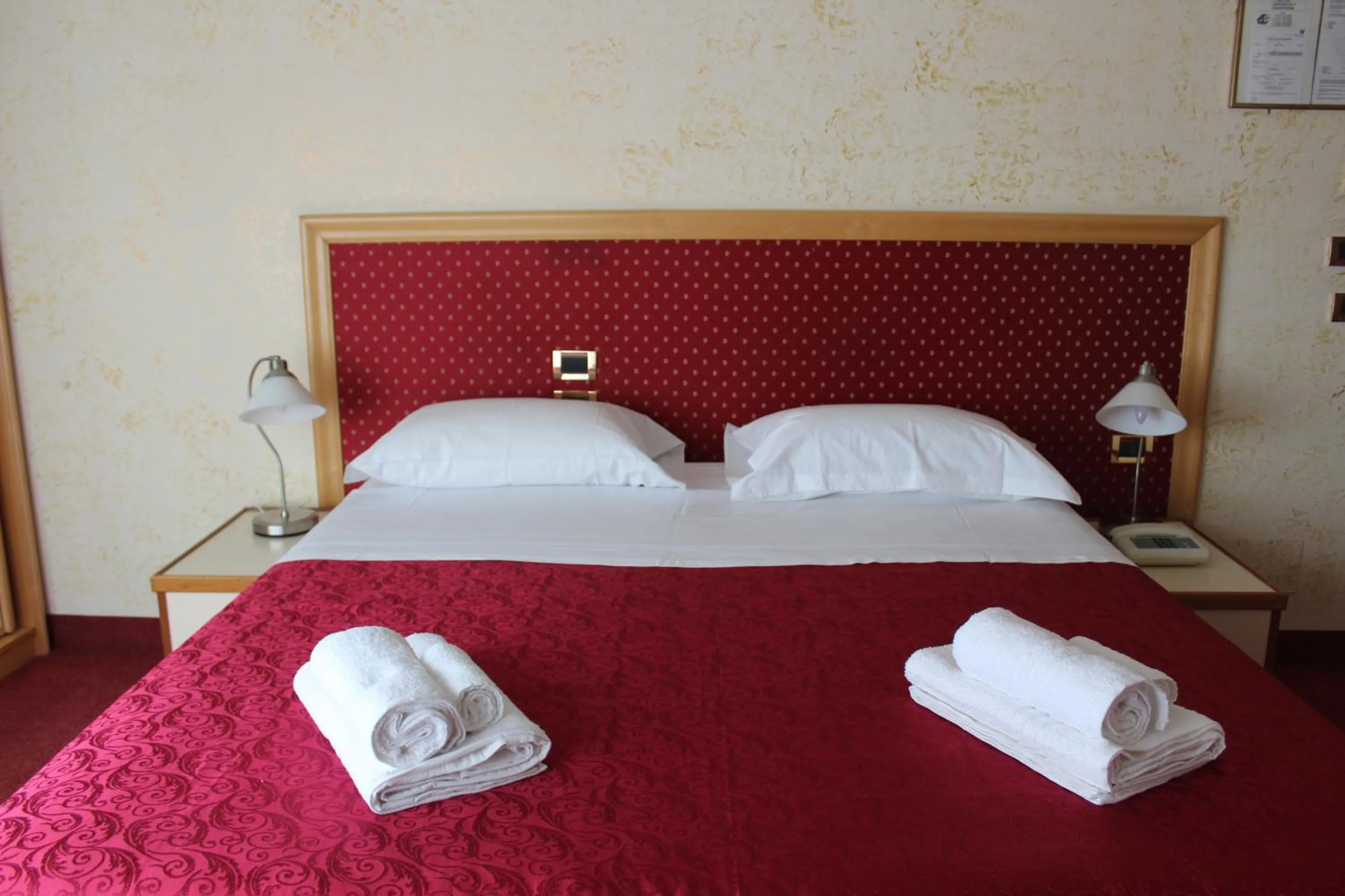 Bed in Hotel Palace Masoanri's