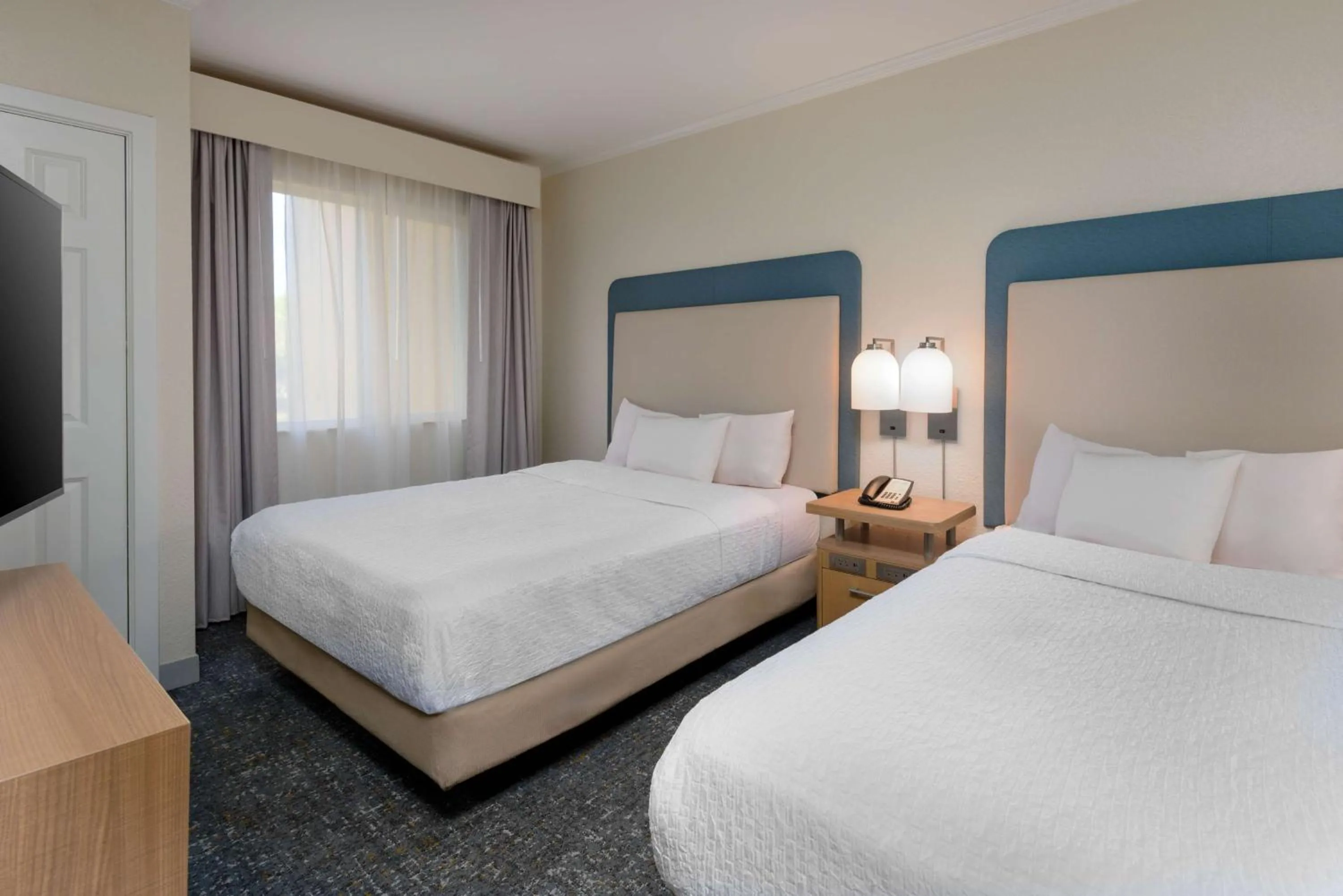 Bed in Homewood Suites by Hilton Bonita Springs, FL