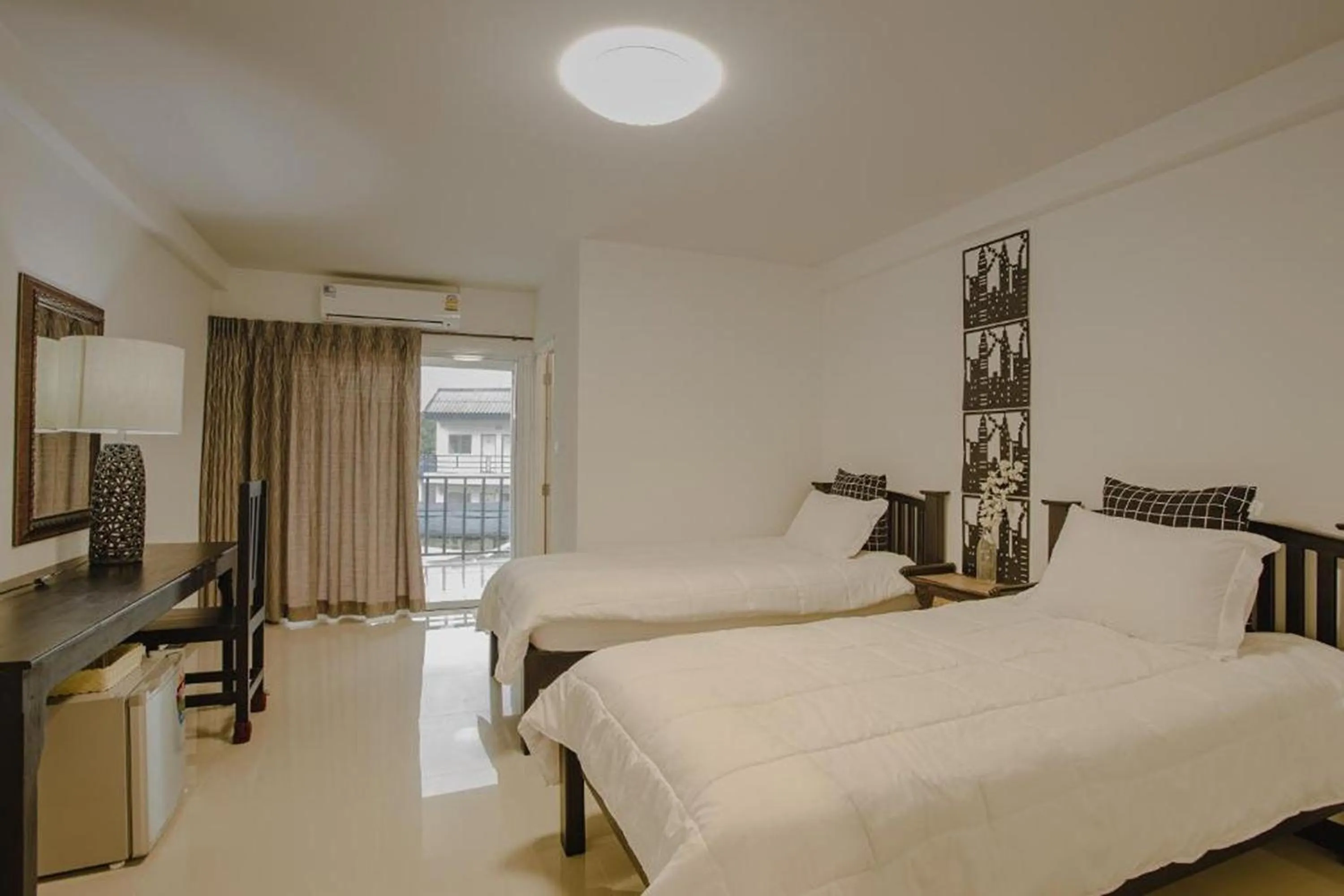 Photo of the whole room, Bed in Banjan Stay