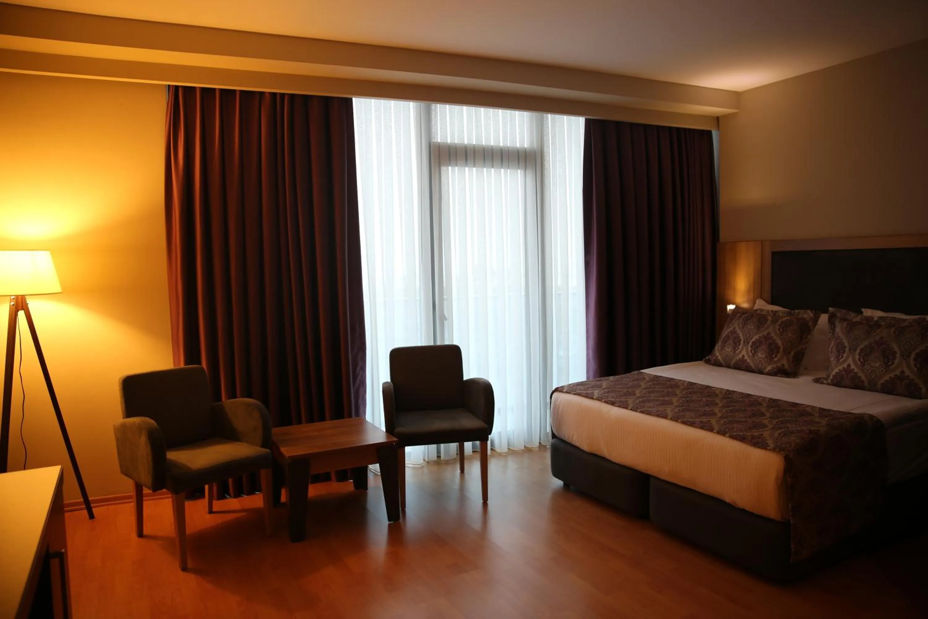 Photo of the whole room, Bed in Euphoria Apartments