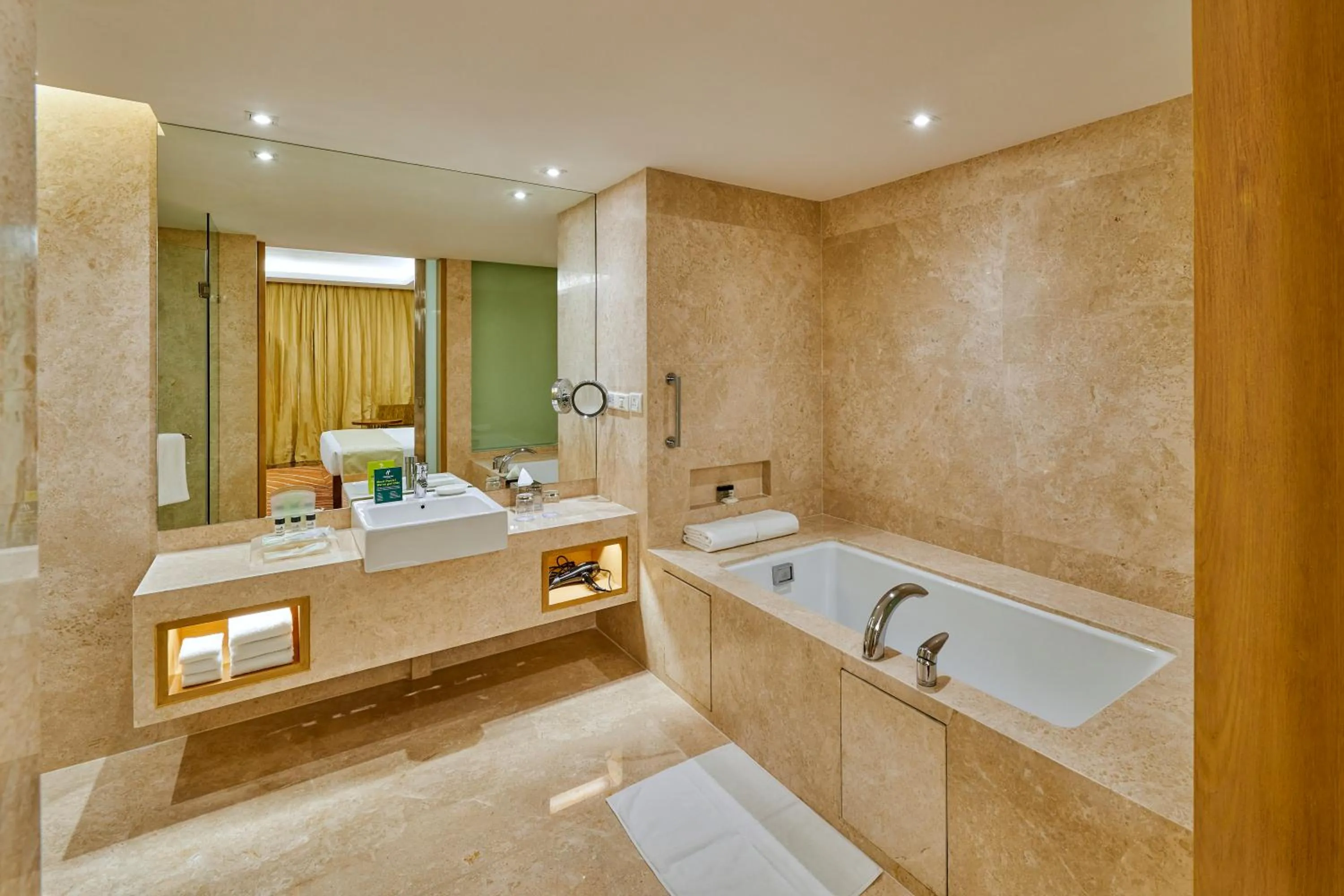 Bathroom in Holiday Inn Mumbai International Airport by IHG