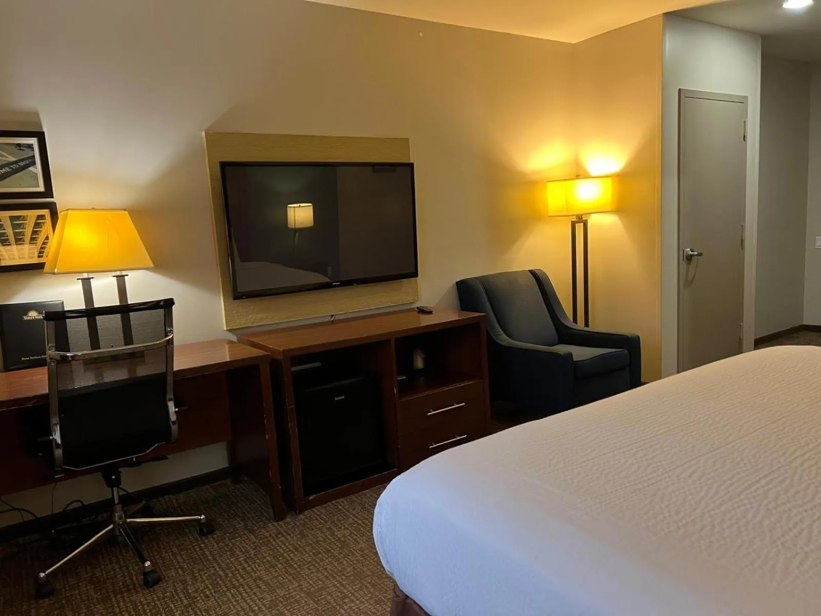 Seating area, Bed in Days Inn by Wyndham Brooklyn Marine Park