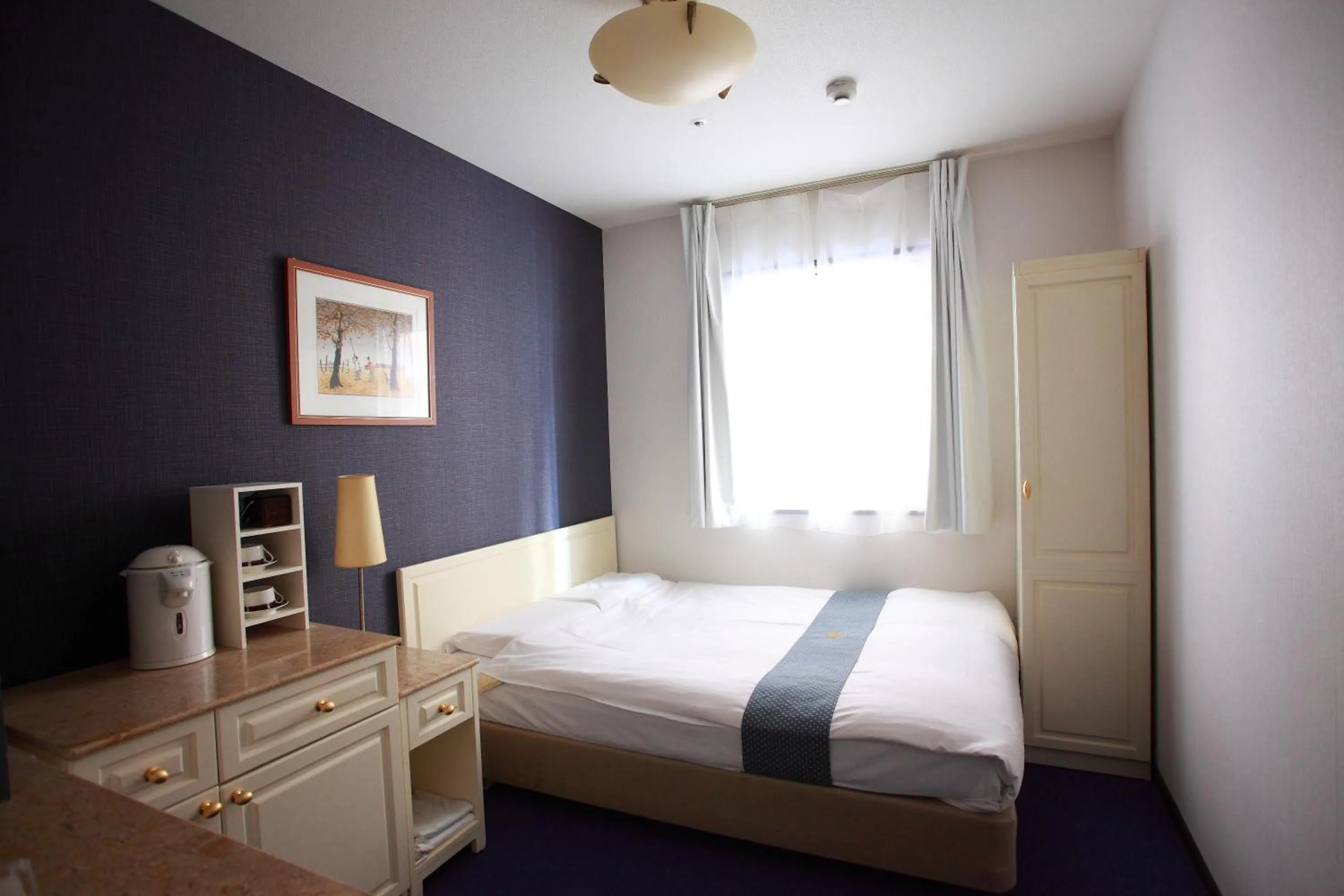 Bed in New Osaka Hotel Shinsaibashi