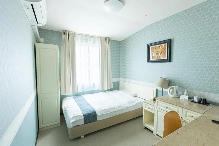 Bed in New Osaka Hotel Shinsaibashi