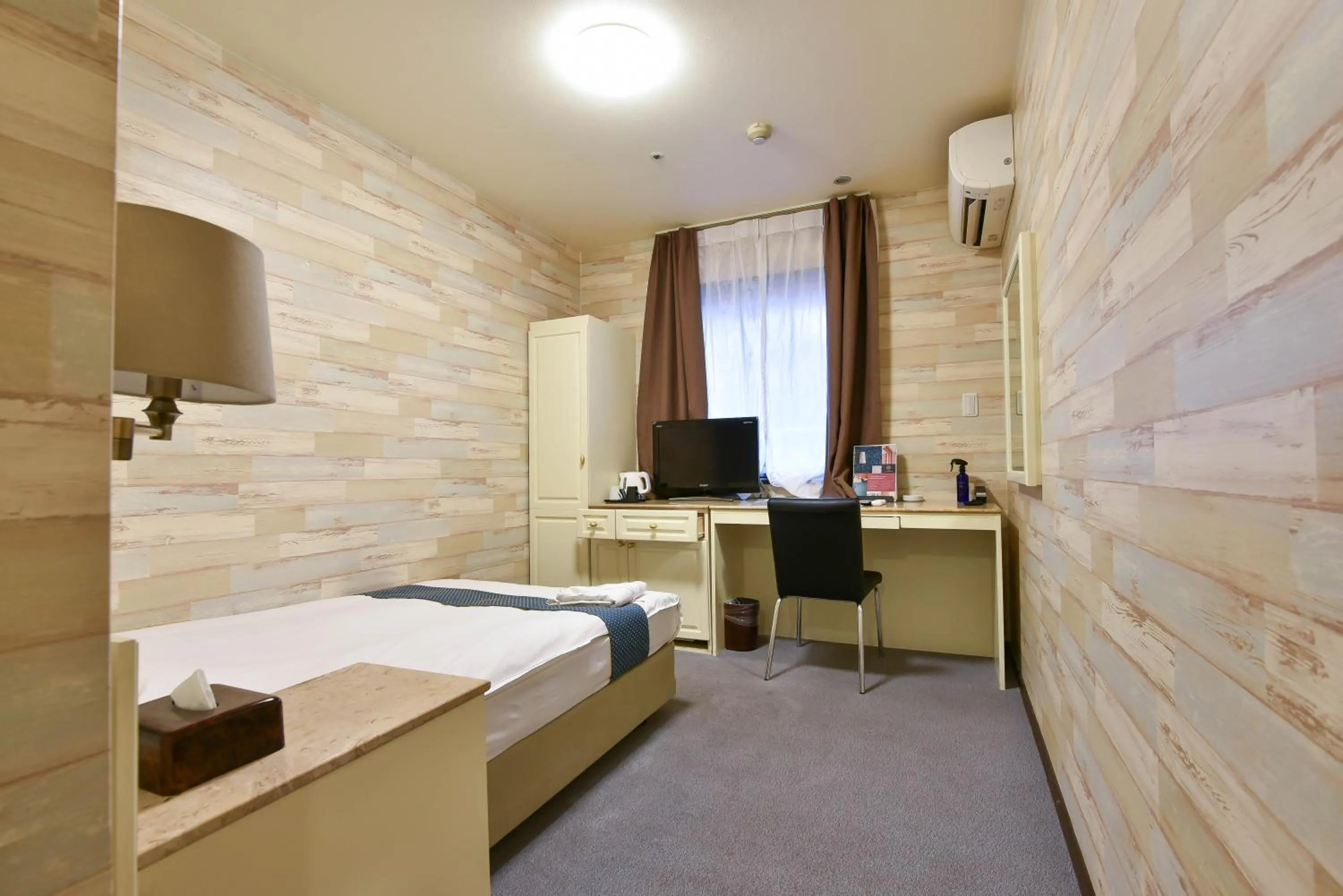 Bed in New Osaka Hotel Shinsaibashi