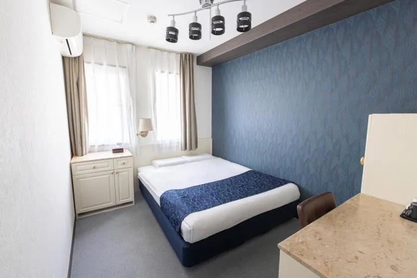 Bed in New Osaka Hotel Shinsaibashi