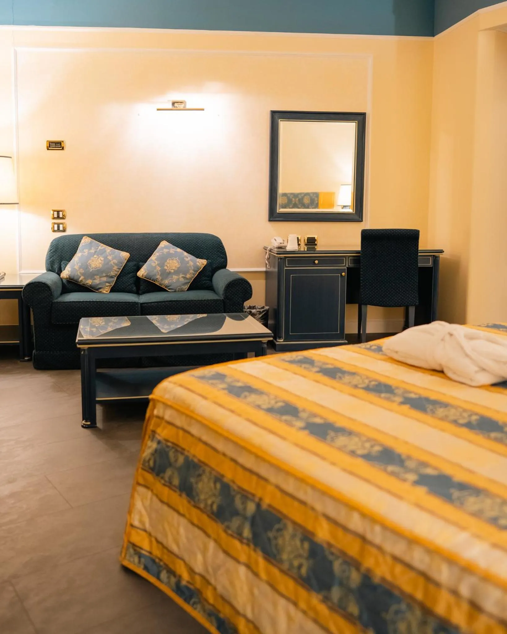 Bed in Altafiumara Resort & Spa