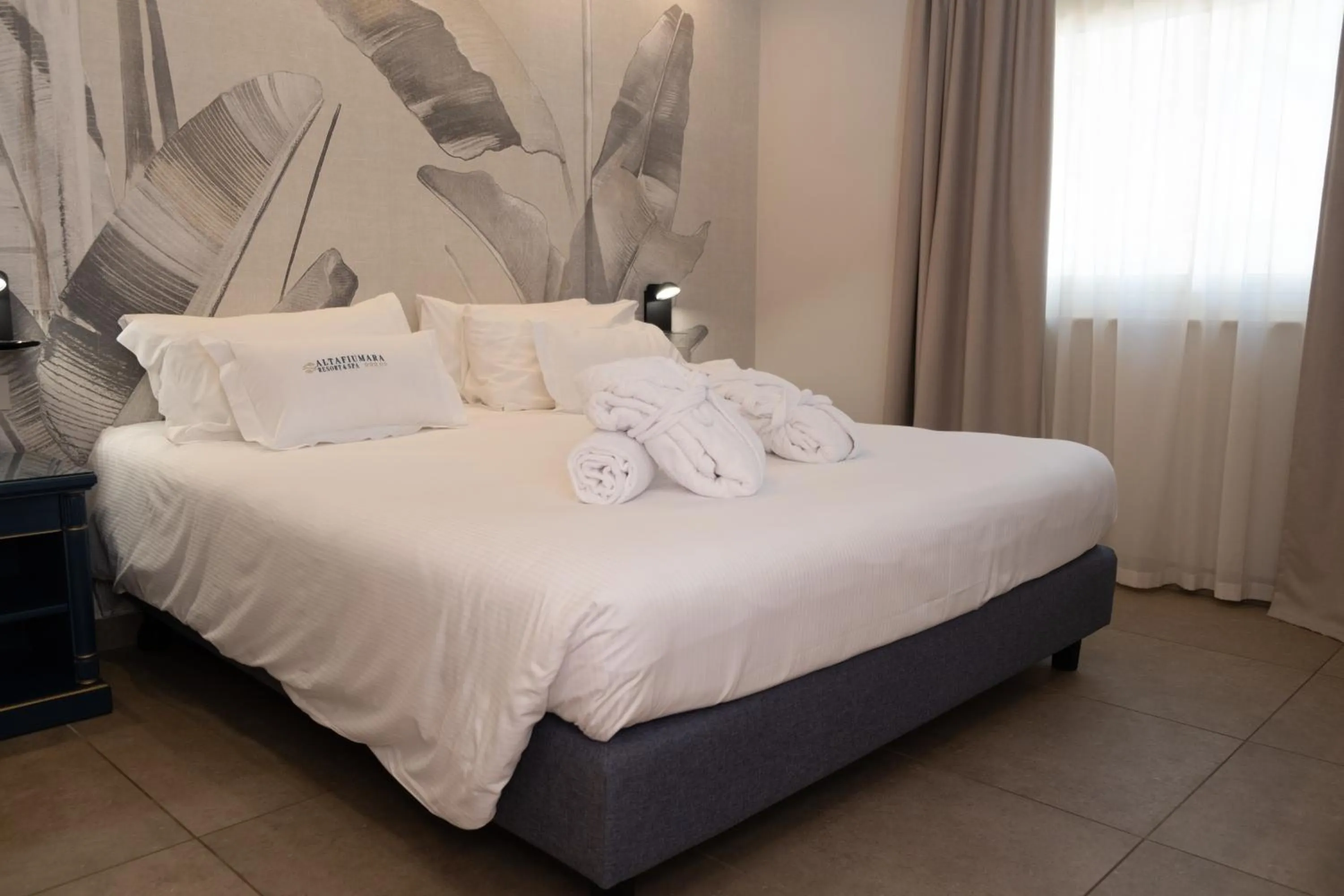 Bed in Altafiumara Resort & Spa