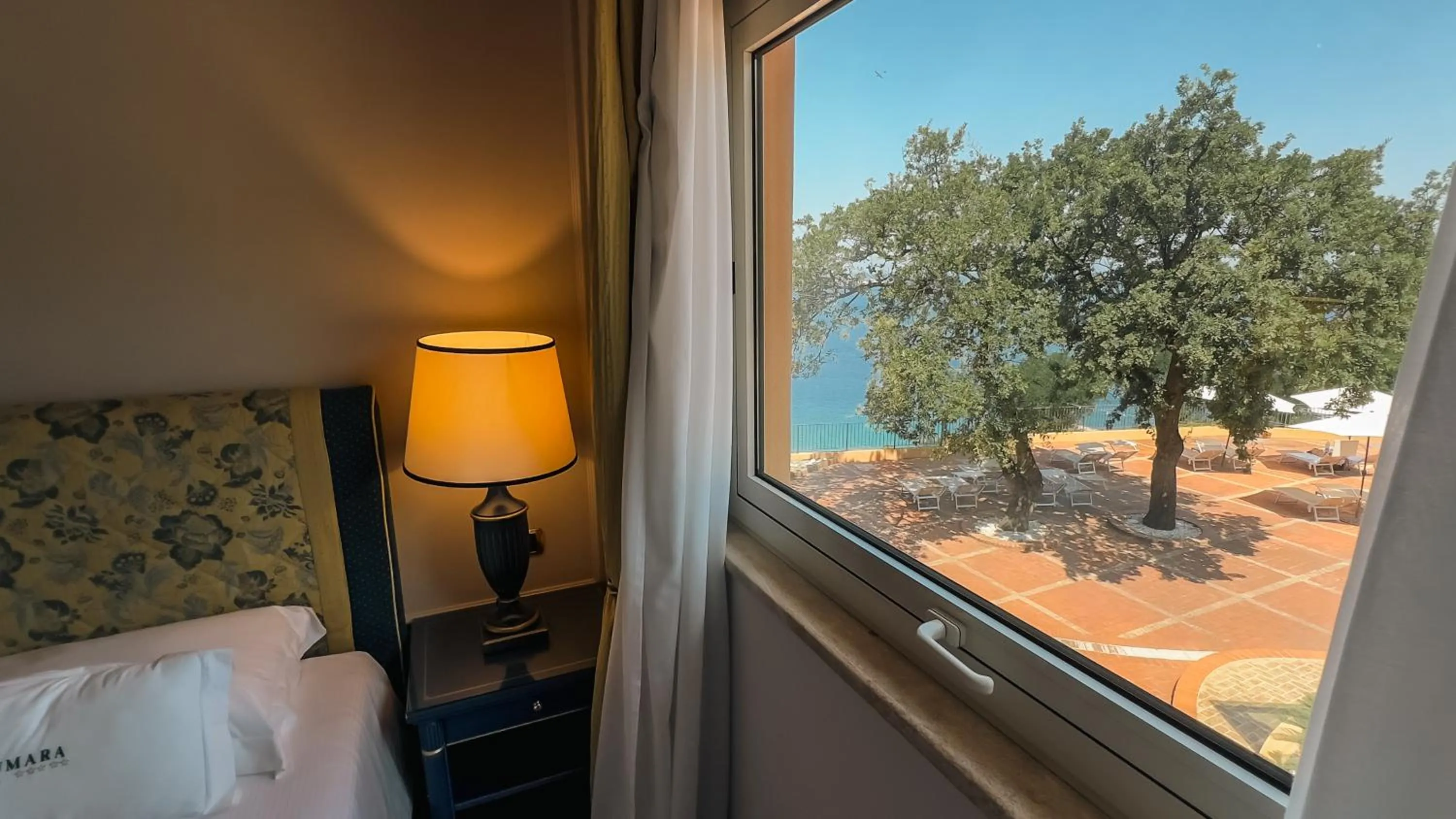 Bed in Altafiumara Resort & Spa