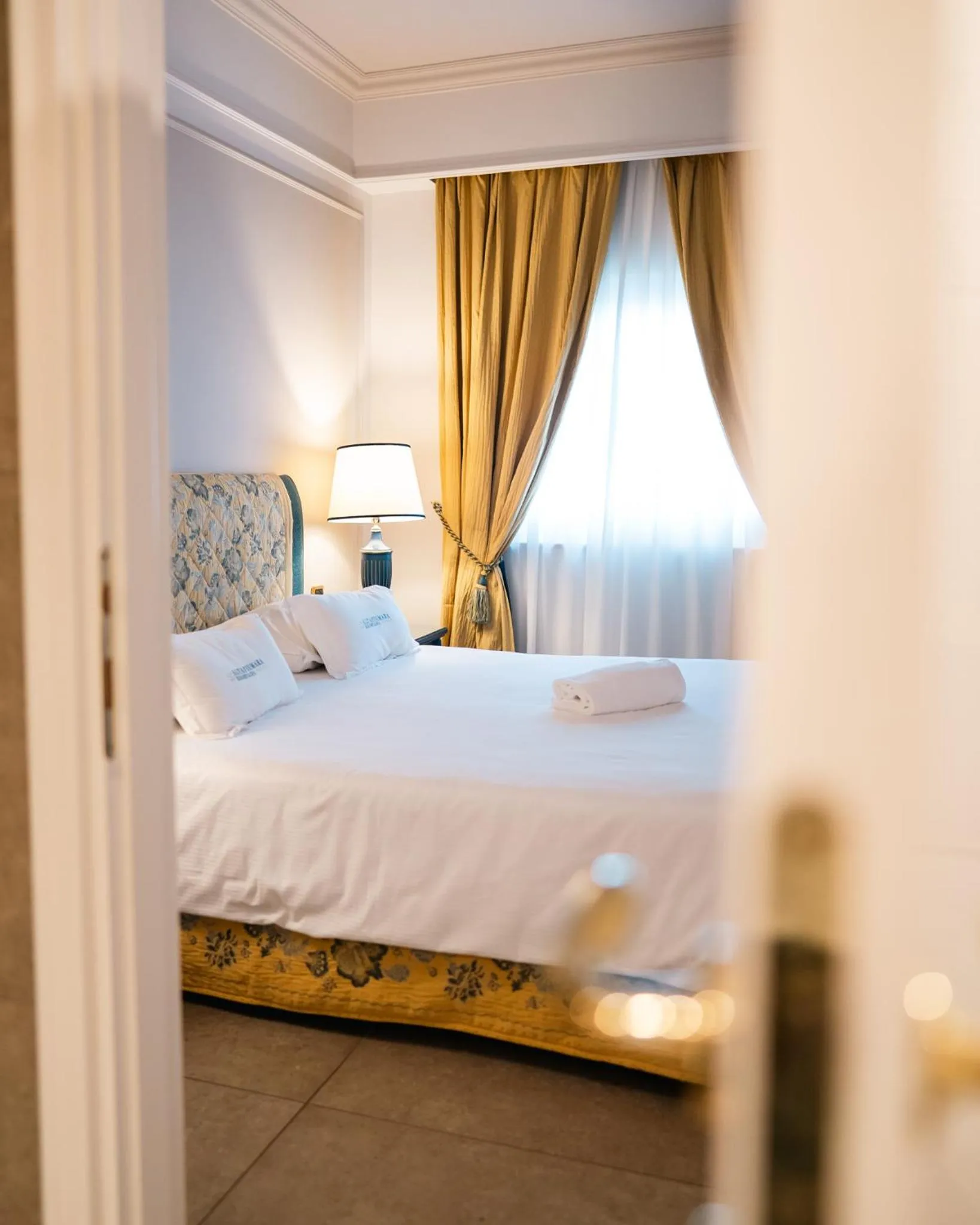 Bed in Altafiumara Resort & Spa