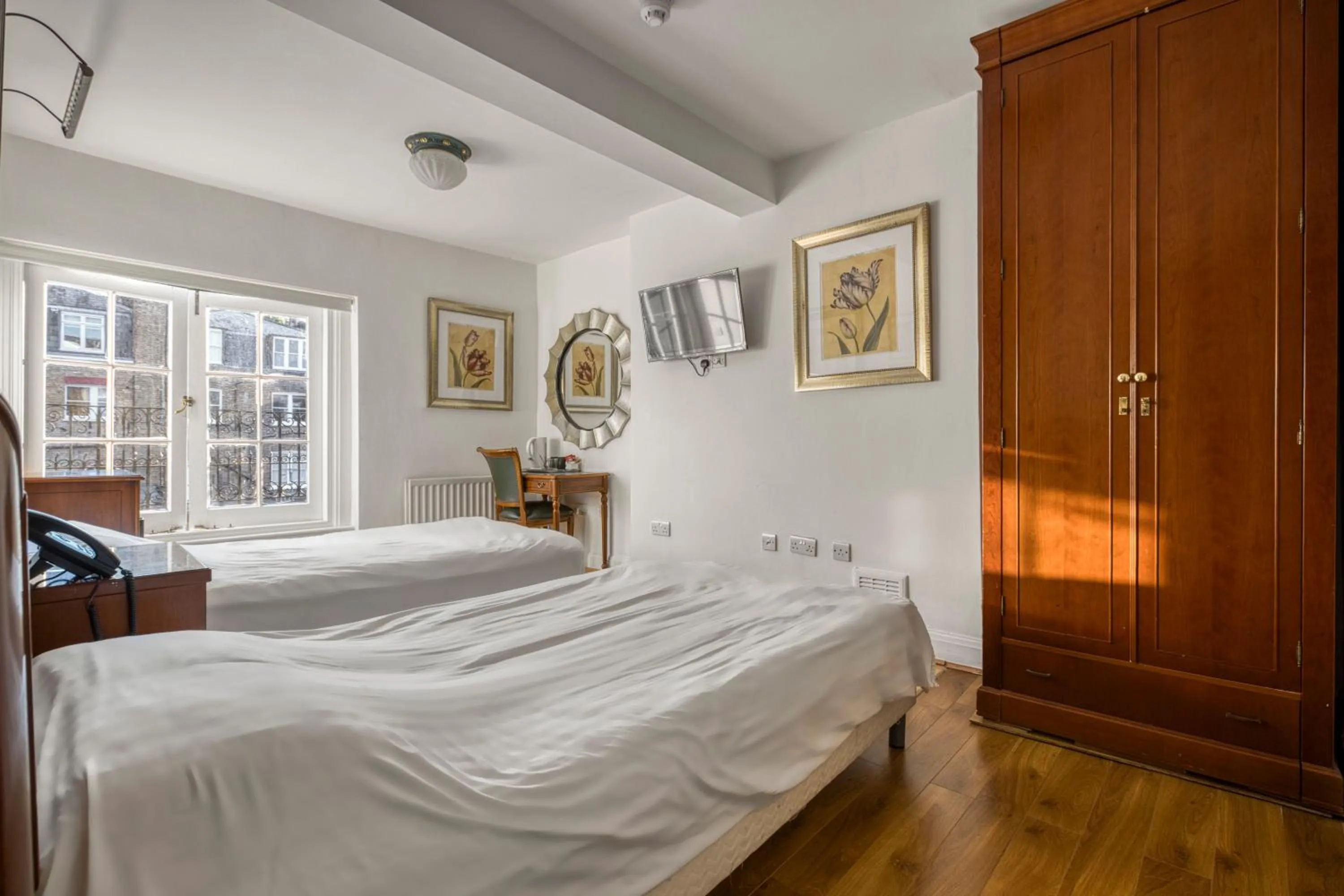 Bed in Opulence Boutique Hotel