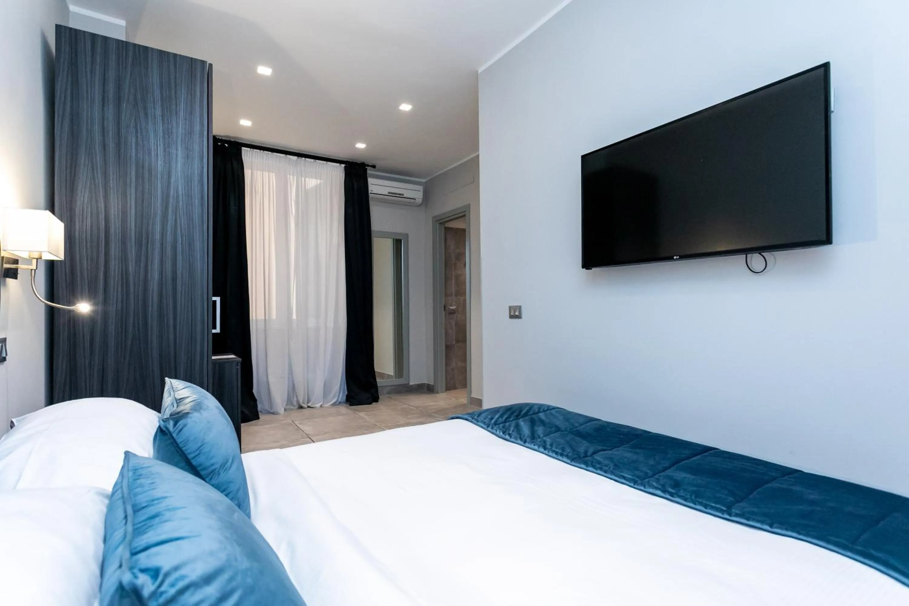 Bed in Cesare ai Cavalieri Suites