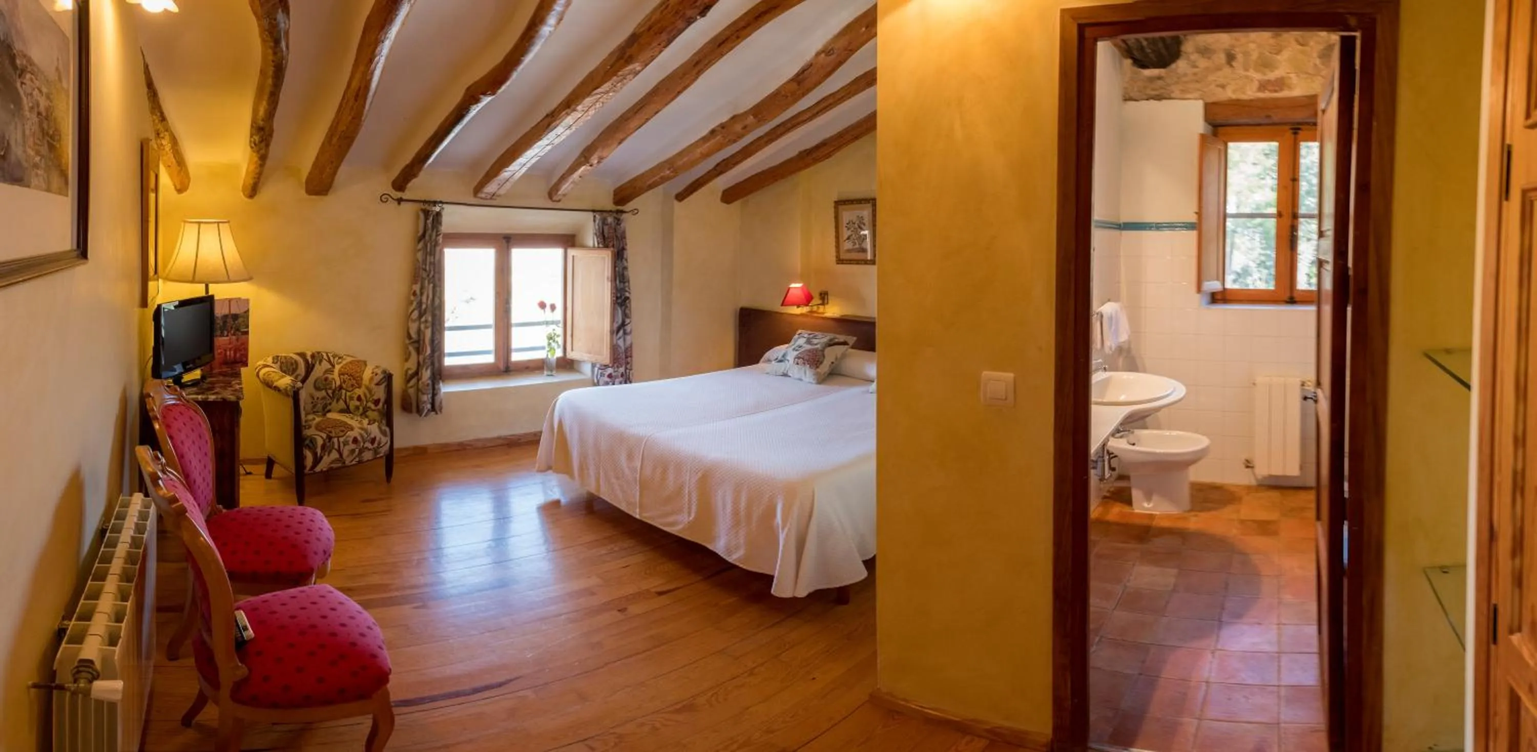 Photo of the whole room, Bed in Hotel Rural Mas Fontanelles