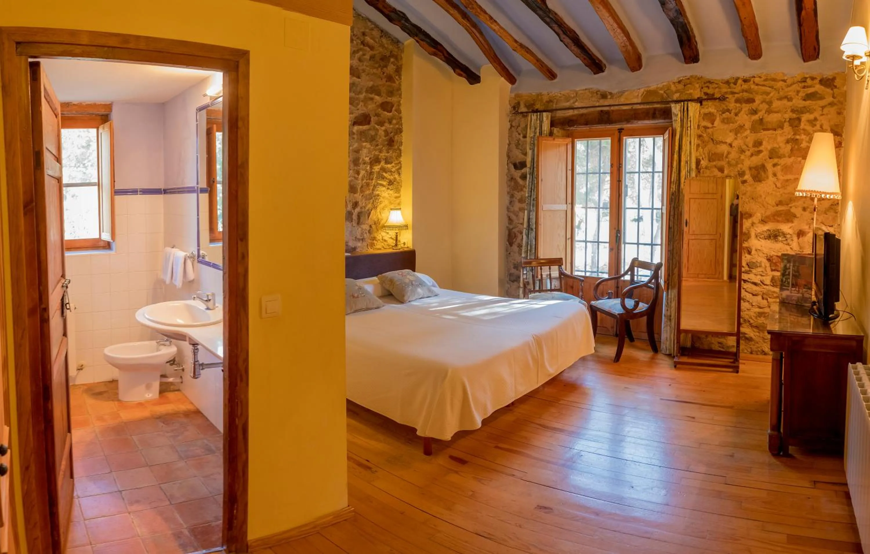 Photo of the whole room, Bed in Hotel Rural Mas Fontanelles