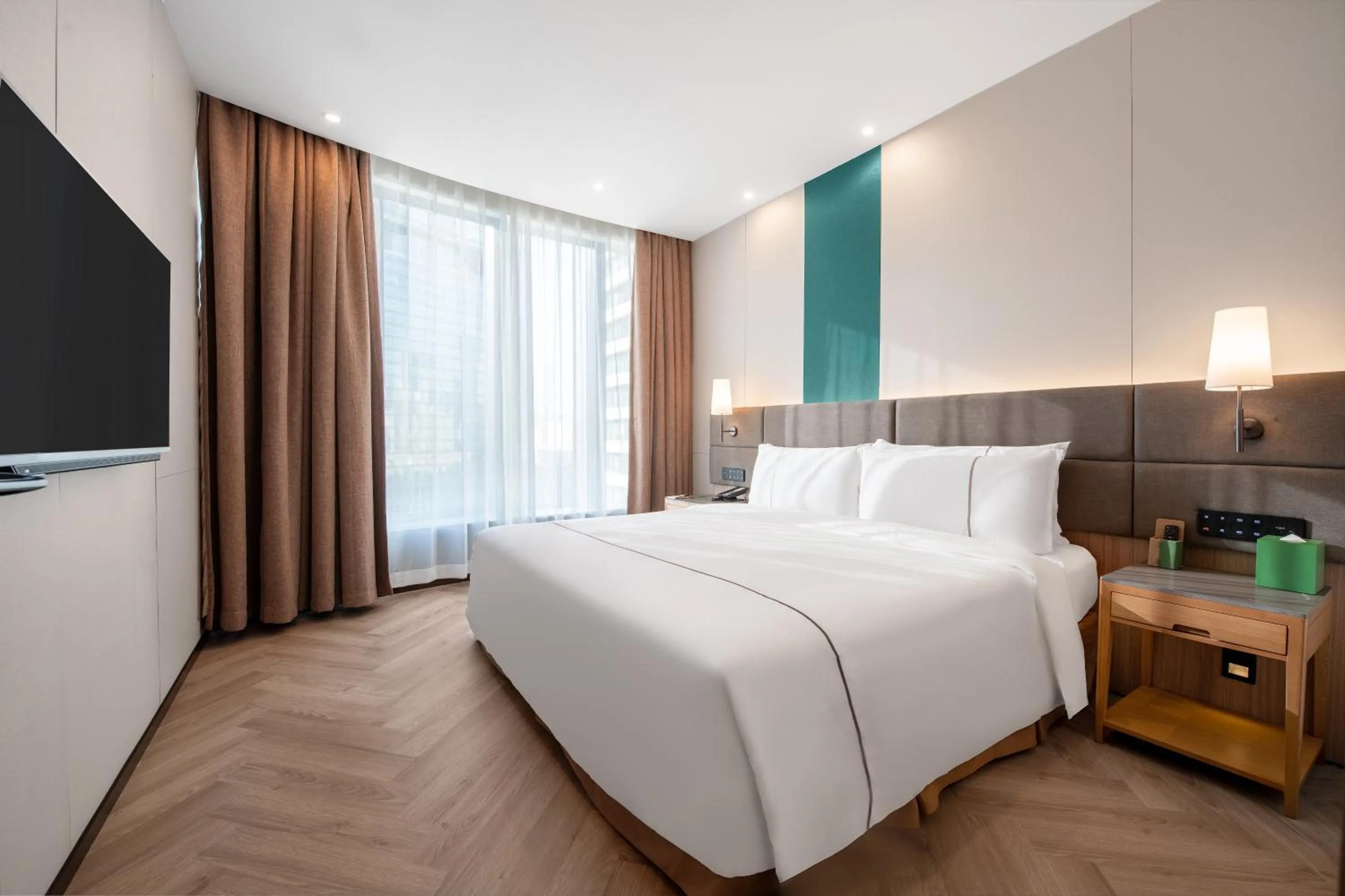 Bed in H' Elite Hotel