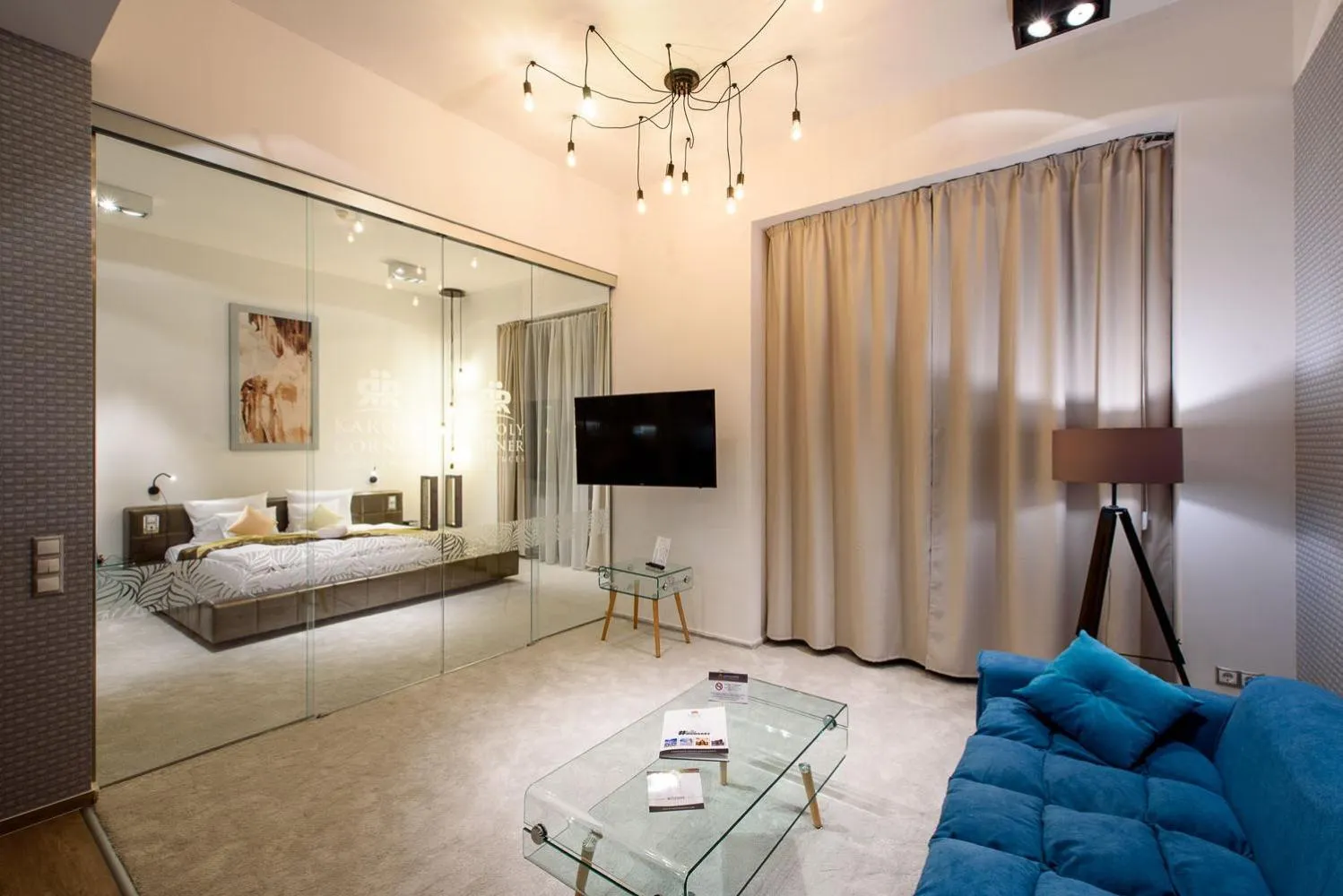Living room, Bed in Karoly Corner Residences