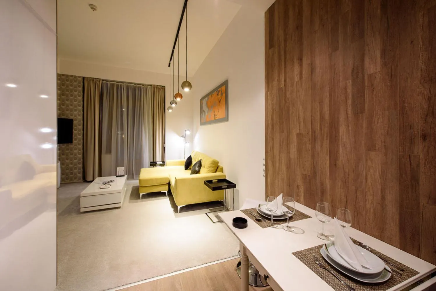Dining area, Bed in Karoly Corner Residences