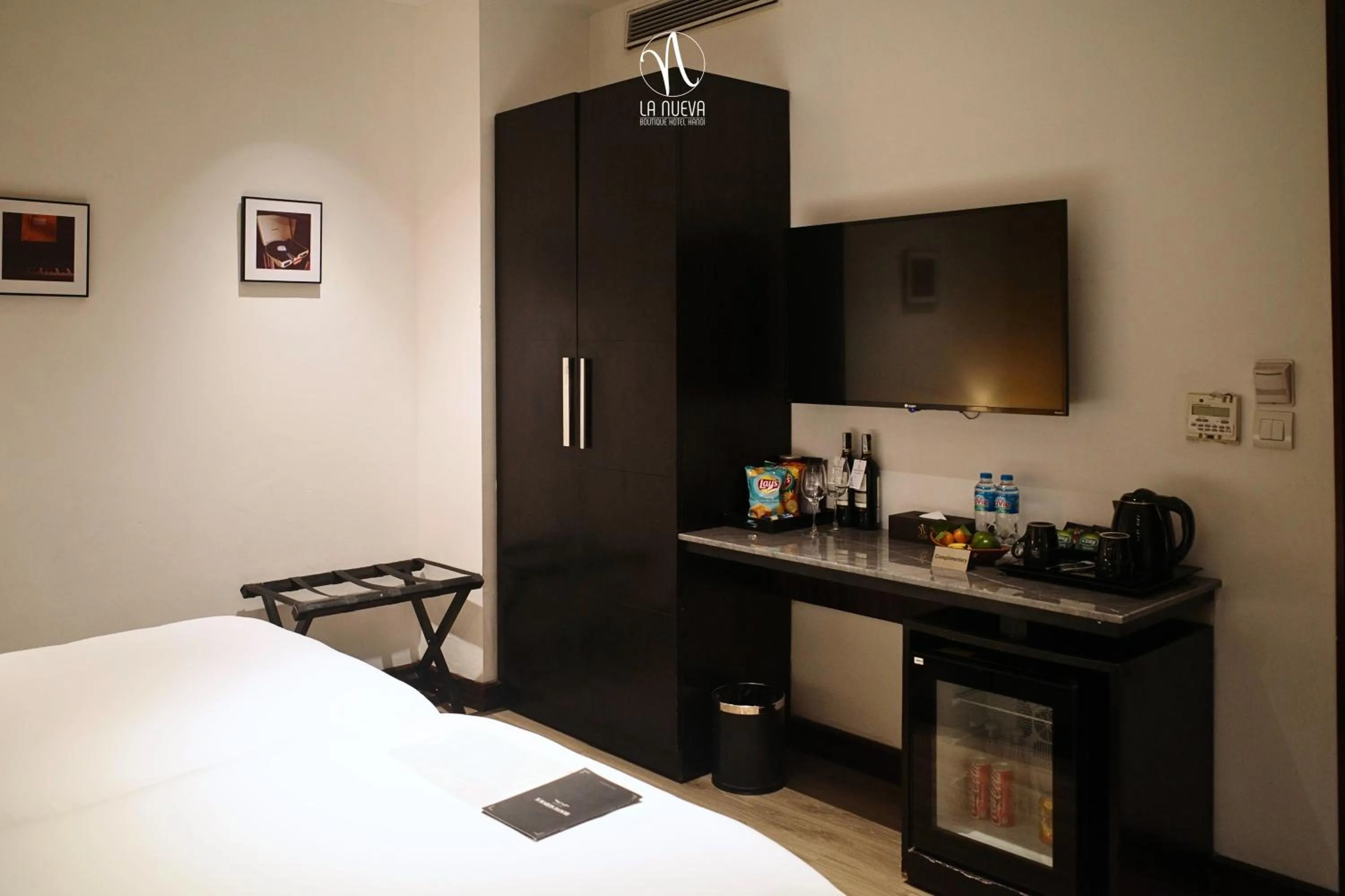 Photo of the whole room, Bed in La Nueva Boutique Hotel Hanoi & Spa