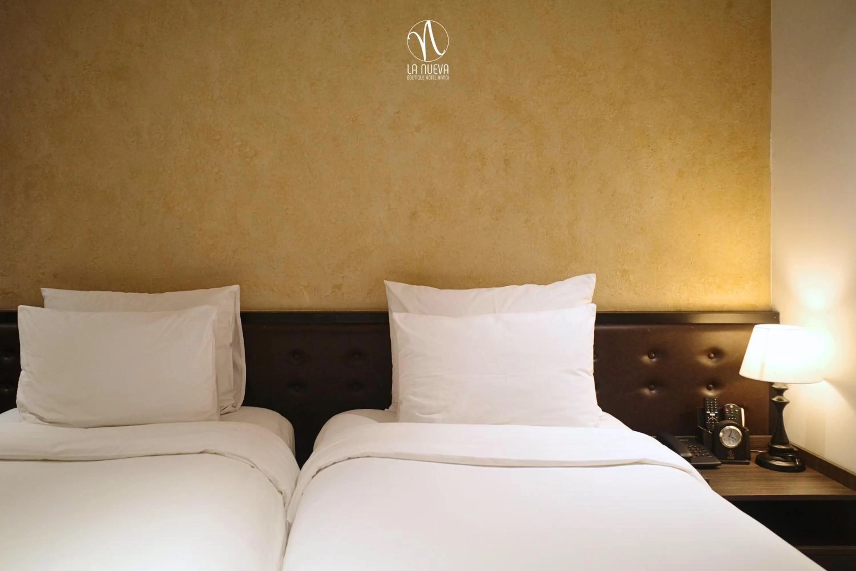 Bed in La Nueva Boutique Hotel Hanoi & Spa